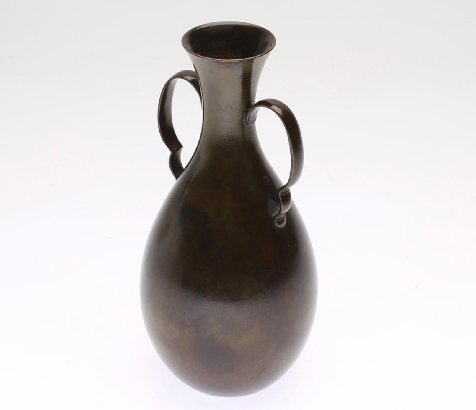 Patinated Bronze vase by Nyköping's Ciselör workshop. Sweden, Circa 1940th.
Marked by manufacturer. Small engraving on one side.
