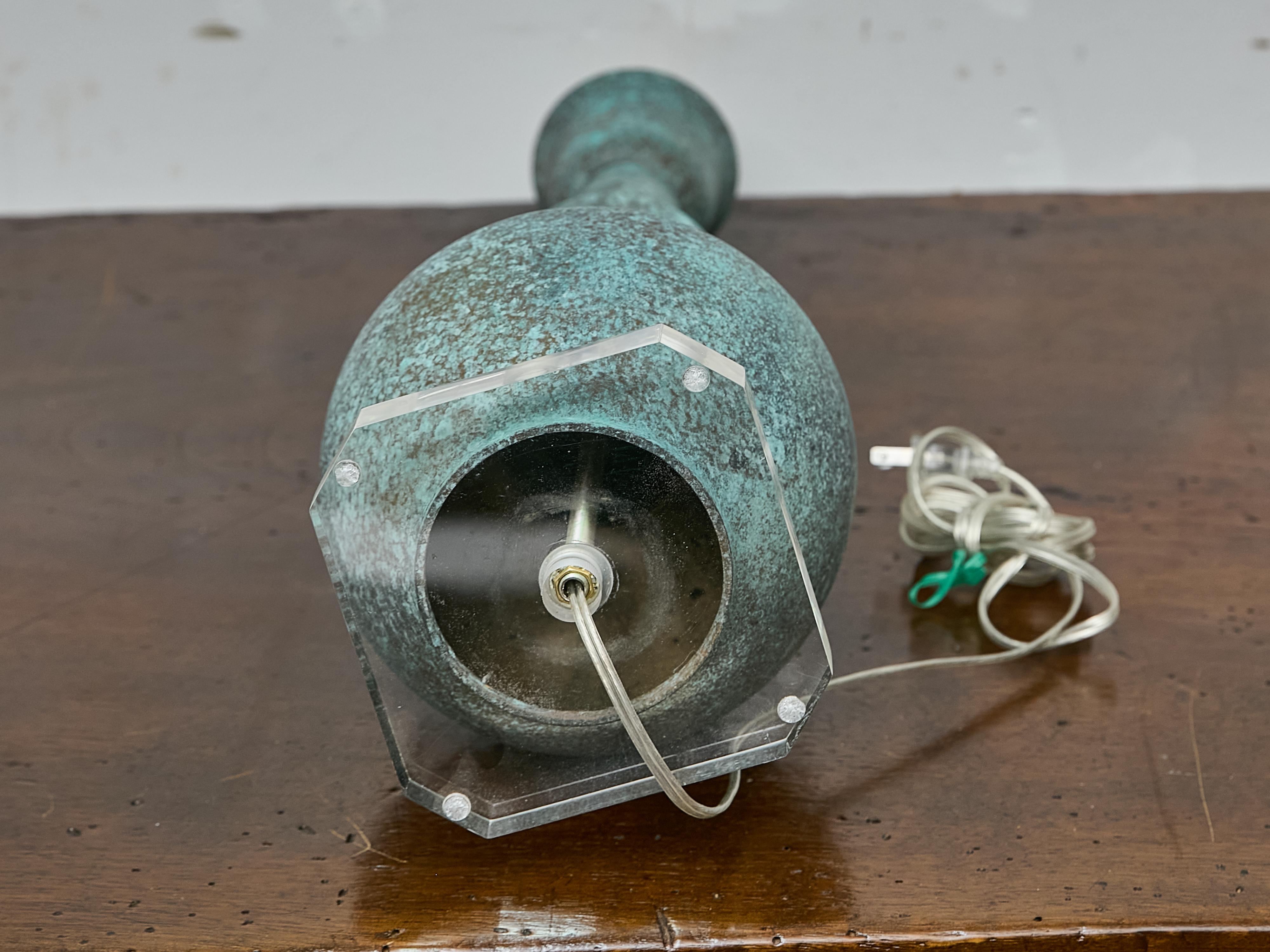 20th Century Patinated Bronze Table Lamp in the Style of James Mont on Lucite Base For Sale