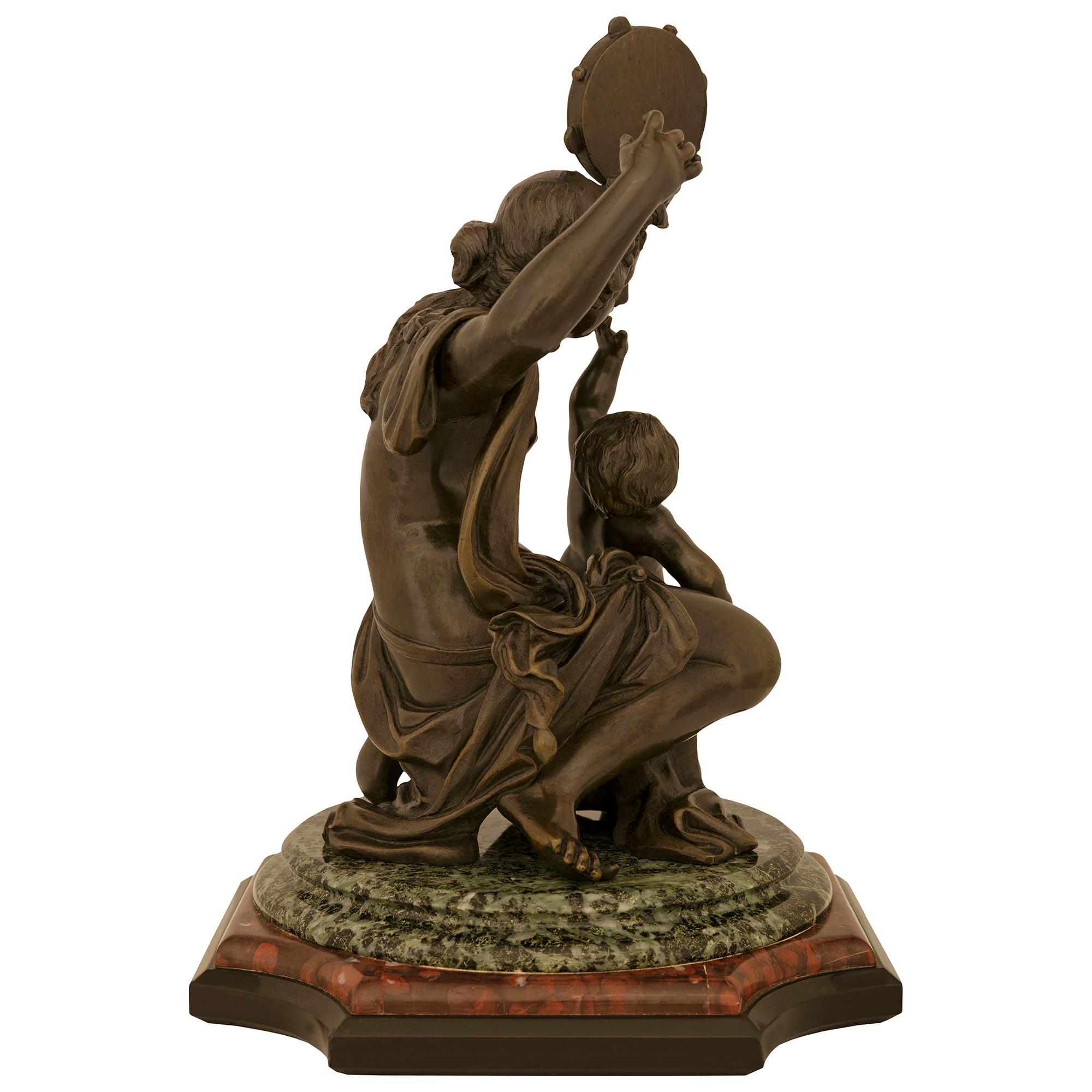 French patinated Bronze, Verde Antico and Rouge Griotte marble statues For Sale