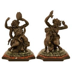 patinated Bronze, Verde Antico and Rouge Griotte marble statues