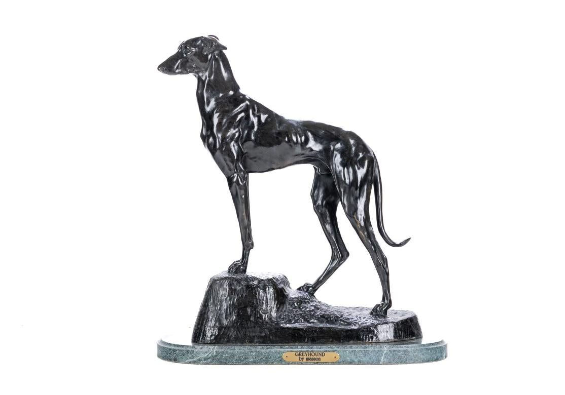 Patinated cast bronze of a greyhound or greyhound crossbreed (lurcher) dog was originally done by French sculptor Jules-Edmond Masson (1871-1932), well known for his figurative and animal sculptures. Mounted on a oval green marble plinth with a