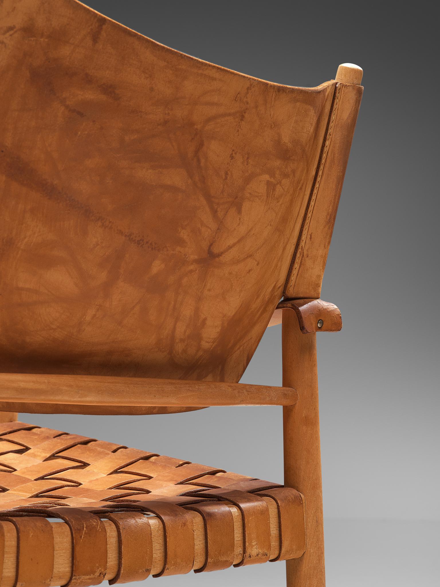 Mid-20th Century Patinated Cognac Leather Safari Chair, Denmark, 1950s