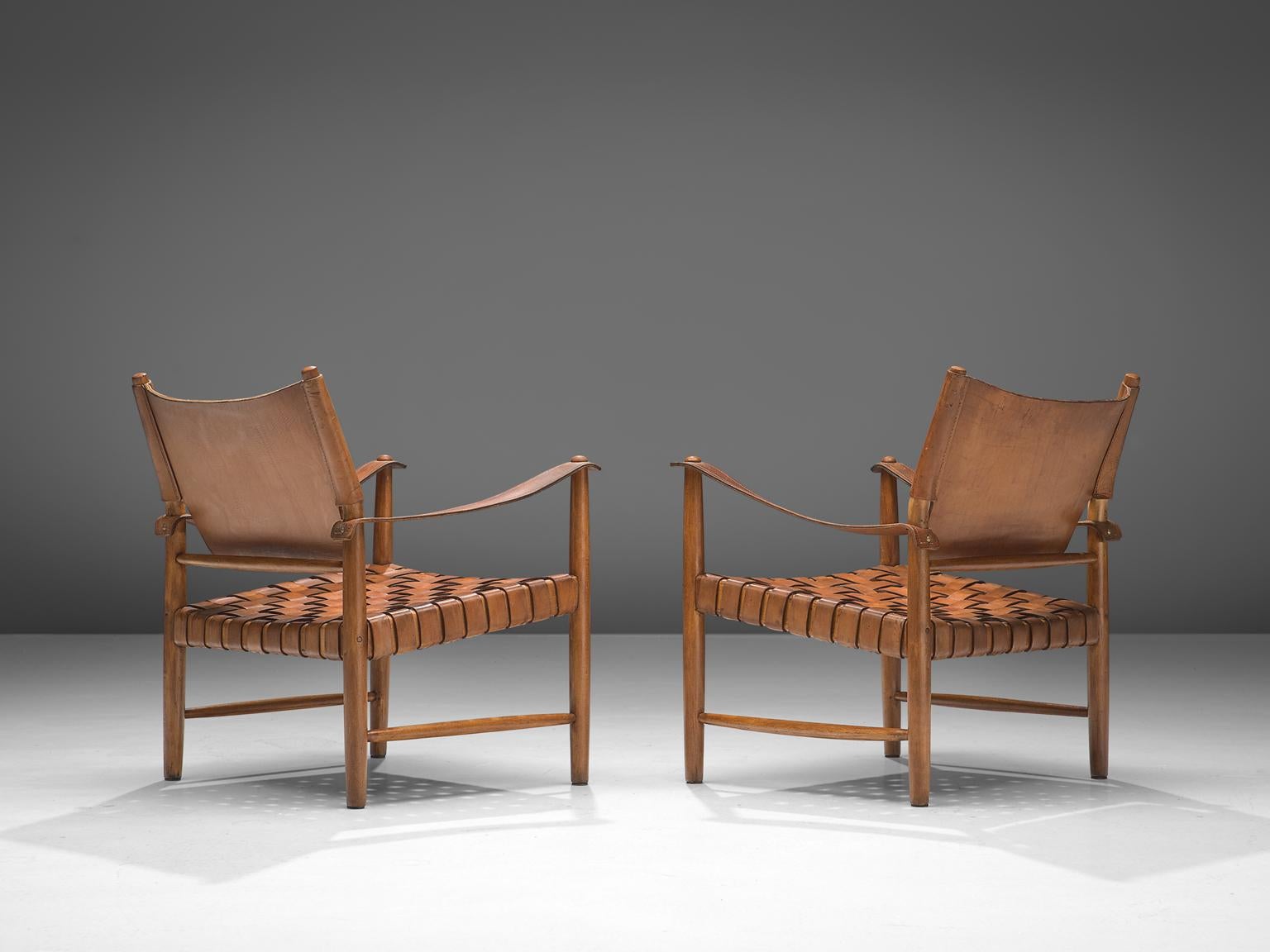 Scandinavian Modern Patinated Cognac Leather Safari Chairs, Denmark, 1950s