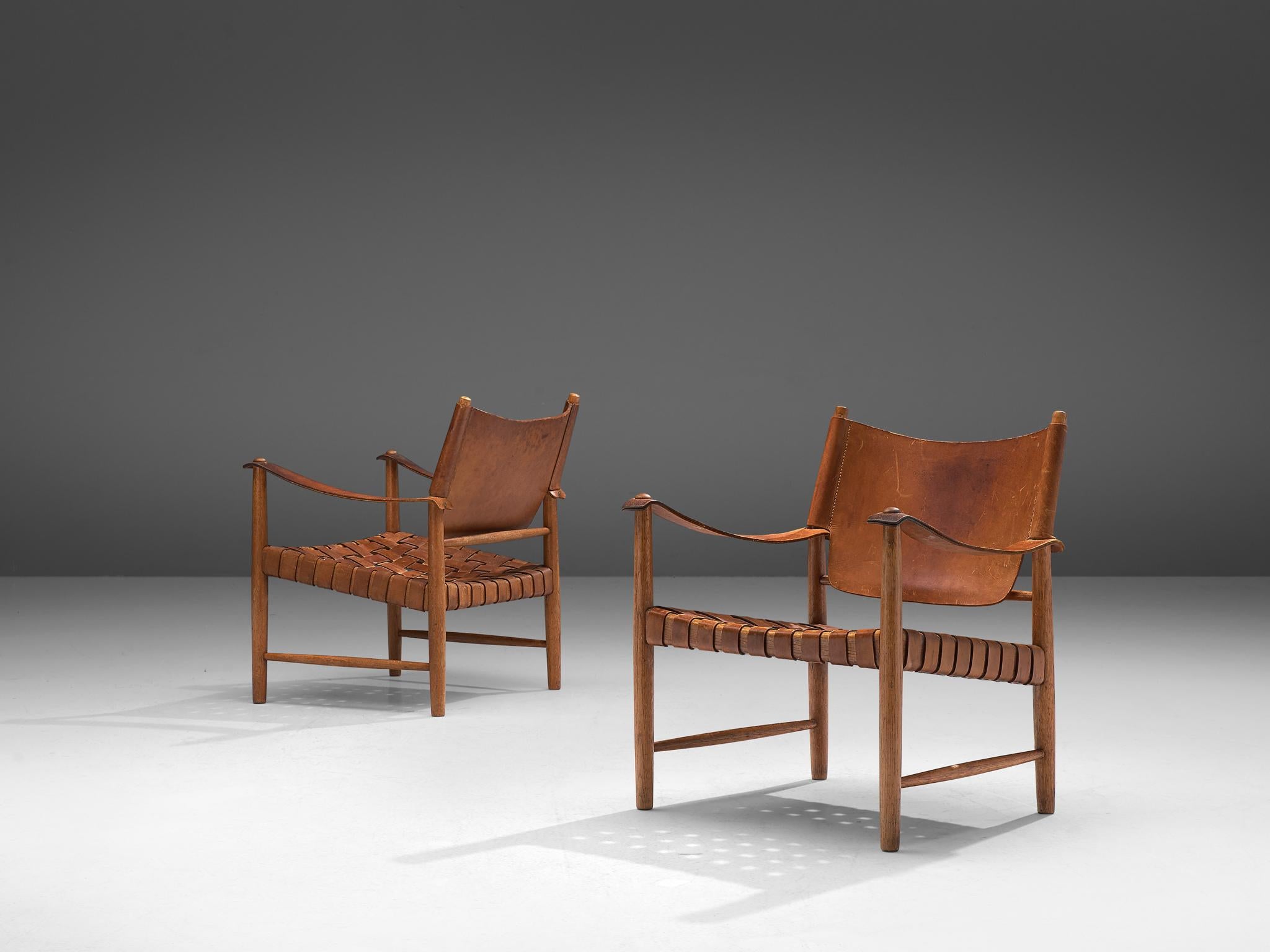 Scandinavian Modern Patinated Cognac Leather Safari Chairs, Denmark, 1950s
