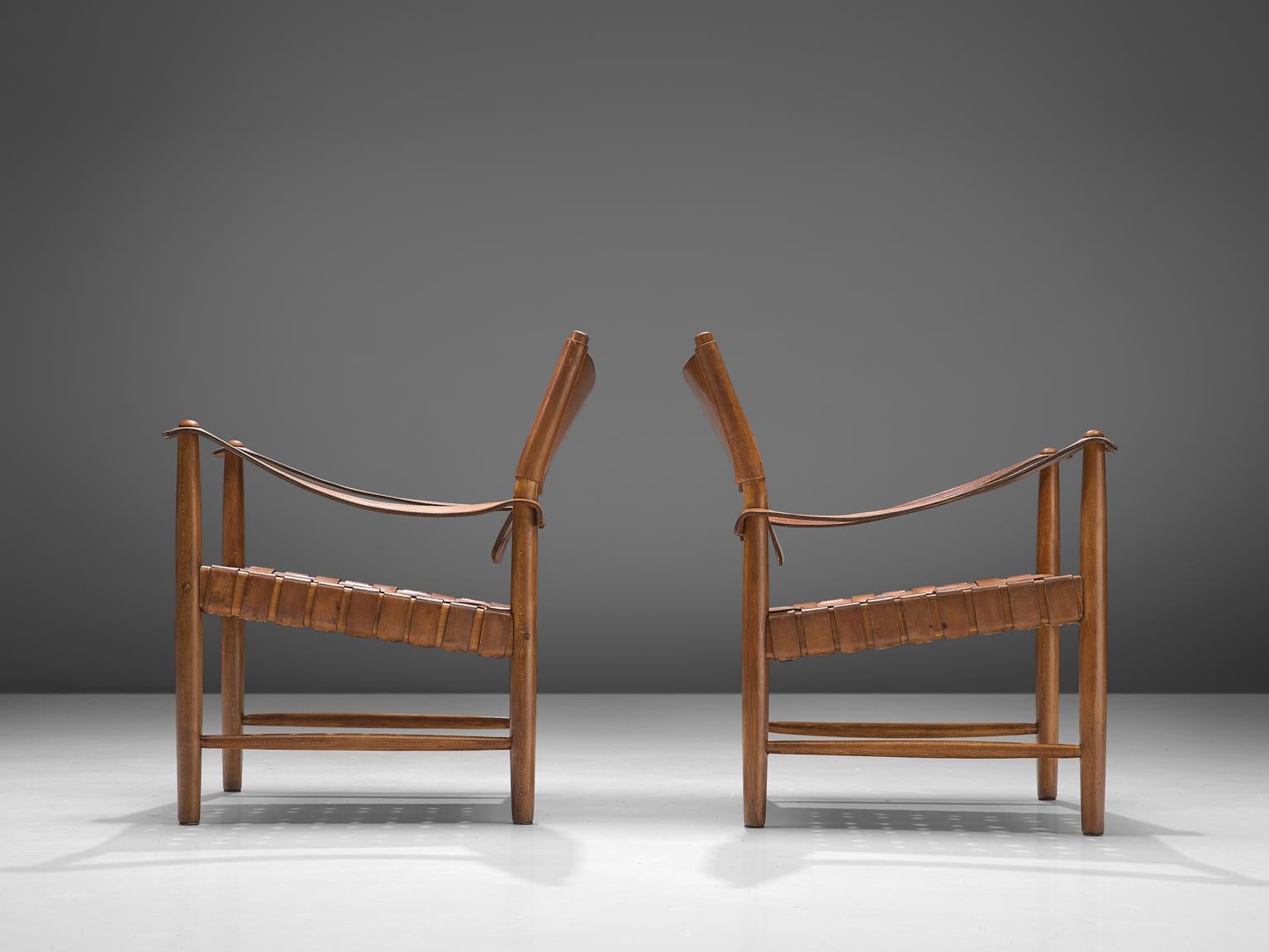 Danish Patinated Cognac Leather Safari Chairs, Denmark, 1950s