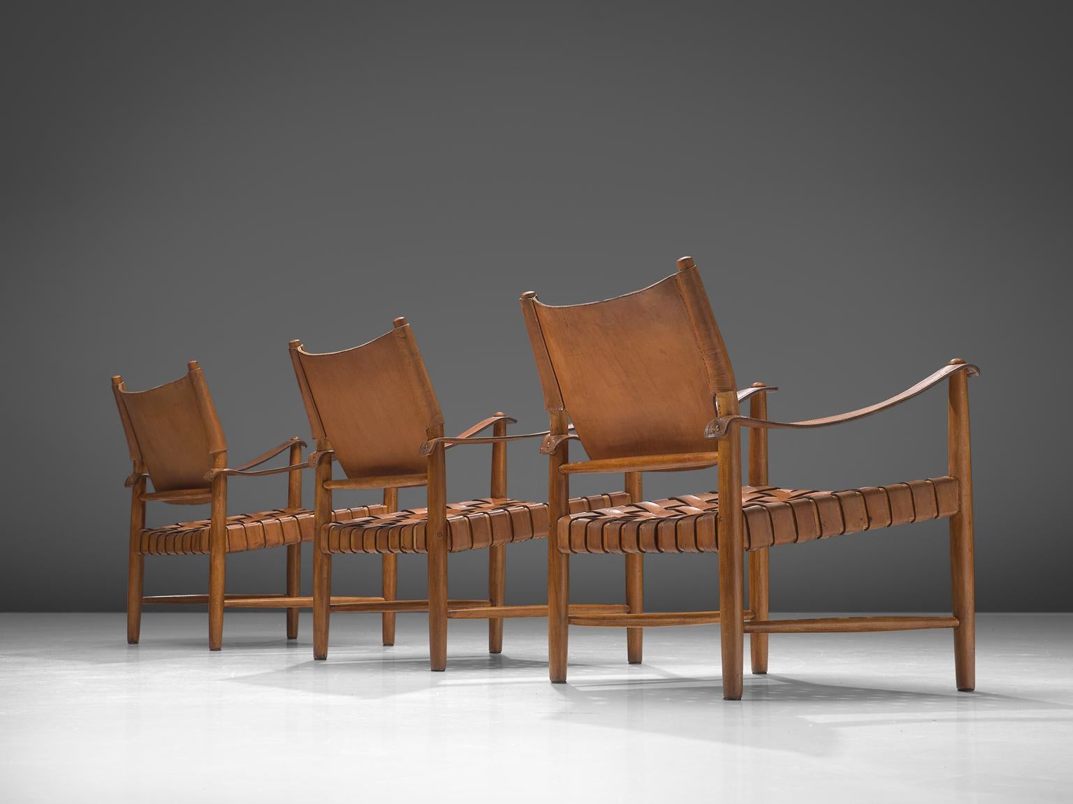 Danish Patinated Cognac Leather Safari Chairs, Denmark, 1950s