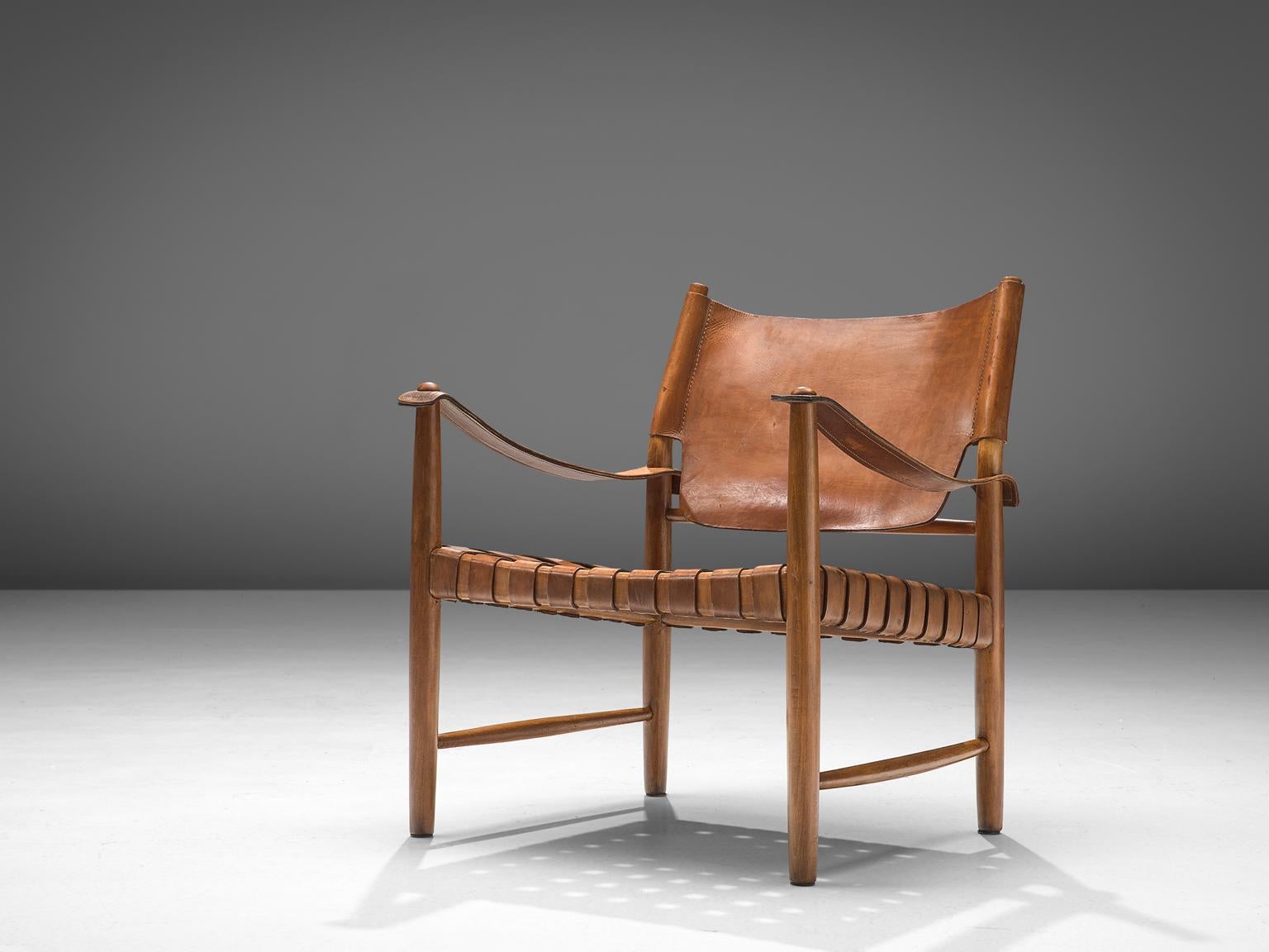 Mid-20th Century Patinated Cognac Leather Safari Chairs, Denmark, 1950s