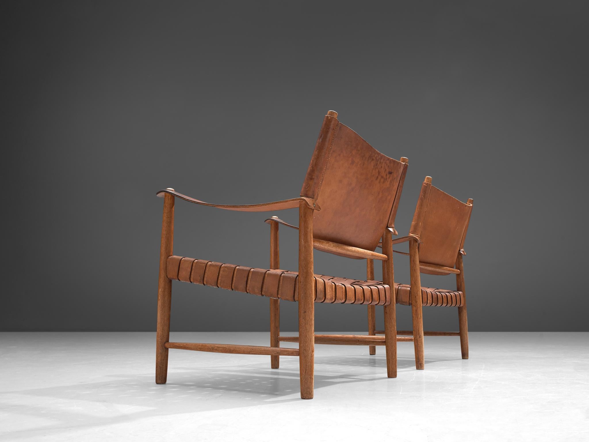 Mid-20th Century Patinated Cognac Leather Safari Chairs, Denmark, 1950s