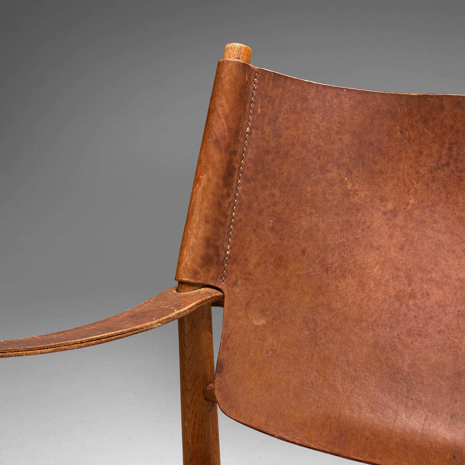 Patinated Cognac Leather Safari Chairs 3