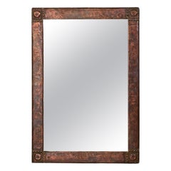 Miroir en cuivre patiné