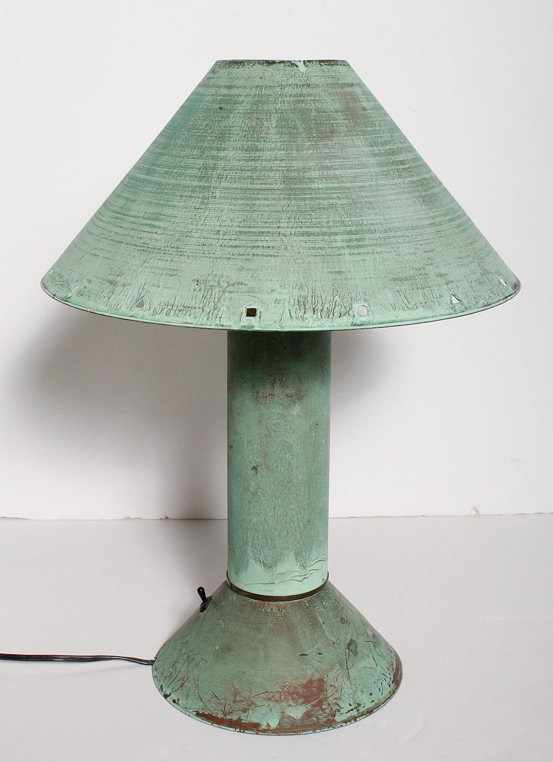Rare oxidized copper version of this highly sought-after 1980s table lamp by Los Angeles-based industrial designer, Ron Rezek.