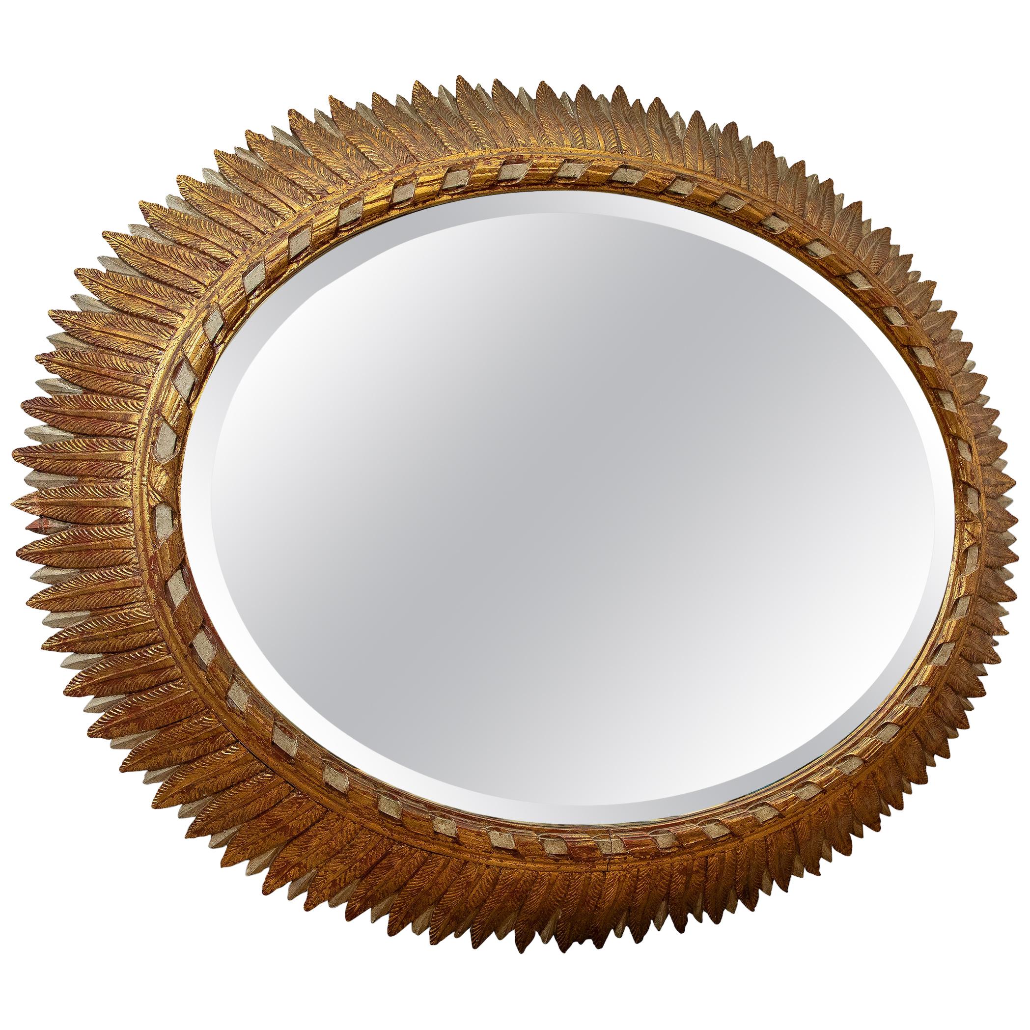 Patinated Carved Wood and Gold Leaf Mirror, France, circa 1950 For Sale