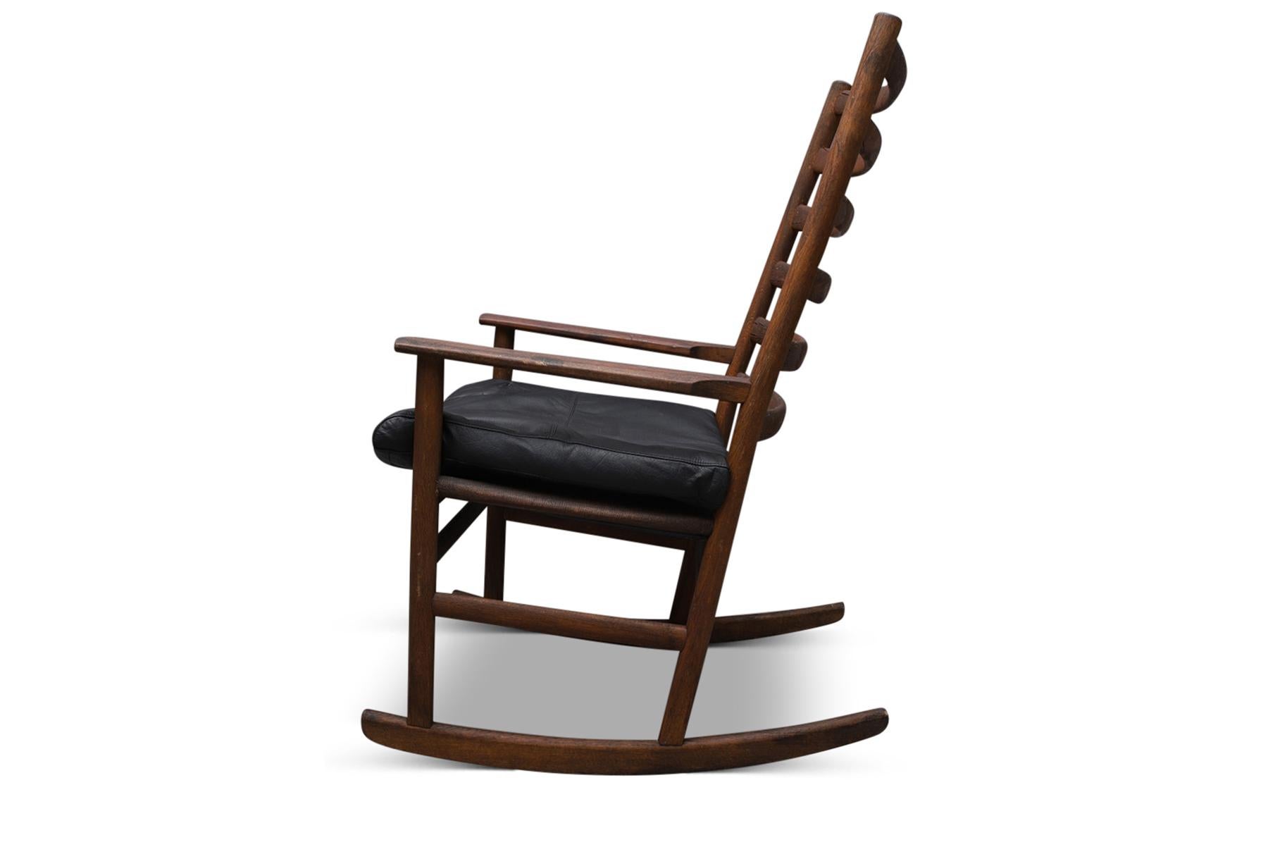 20th Century Patinated Danish Modern Teak Highback Rocking Chair For Sale