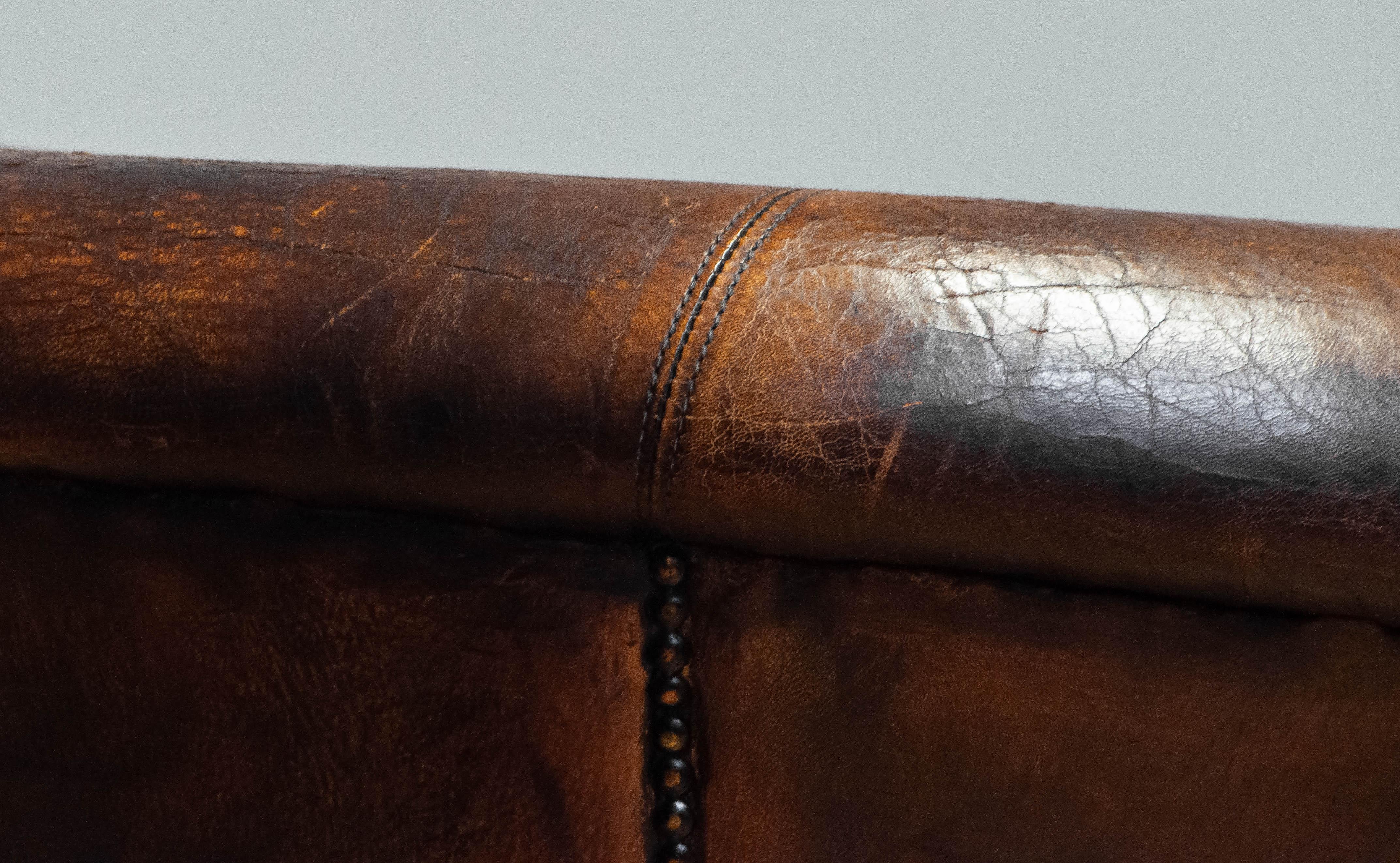 Patinated Dark Brown Dutch Colonial Sheepskin Lounge Club Chair. 1960s For Sale 6