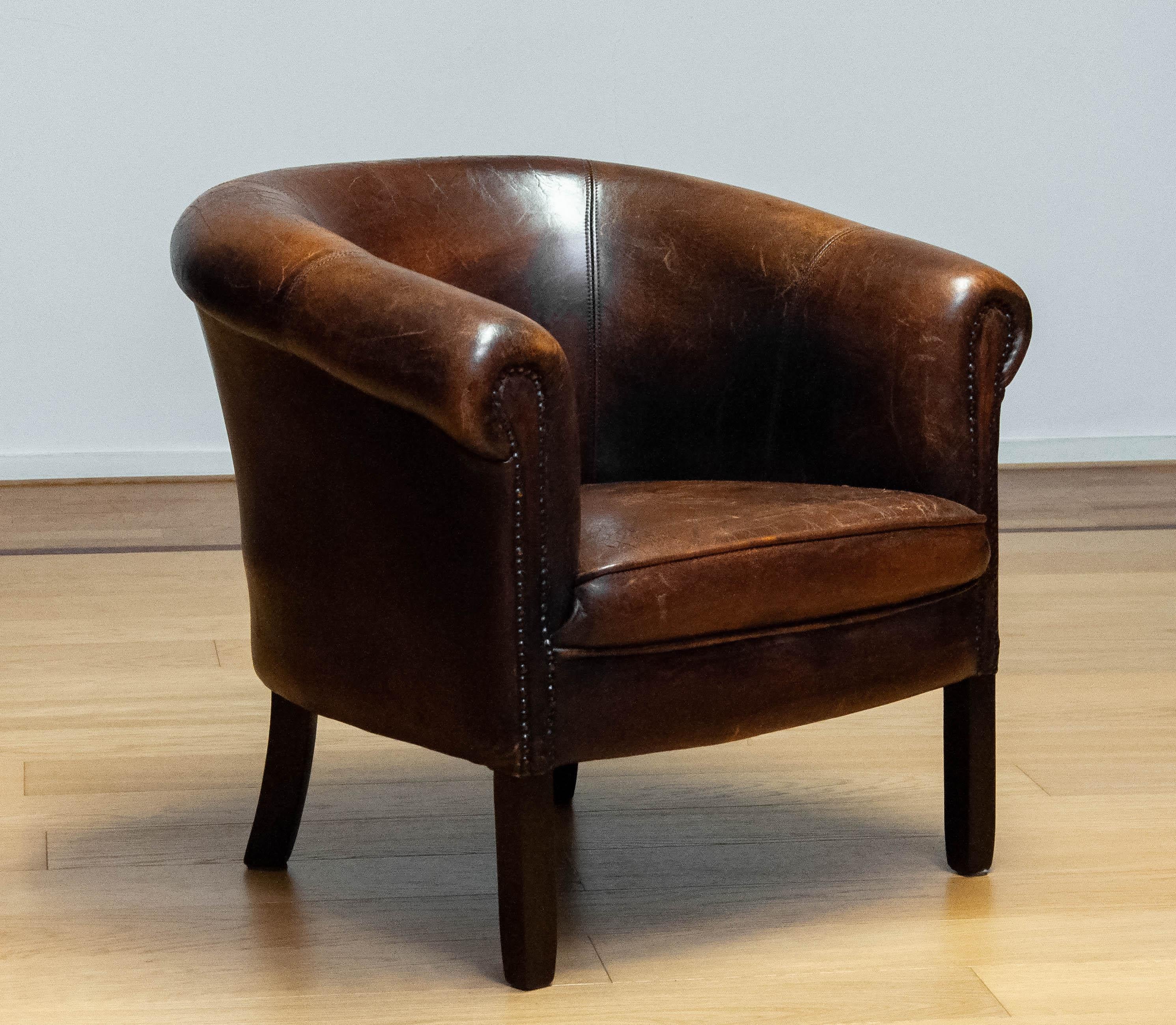 Patinated Dark Brown Dutch Colonial Sheepskin Lounge Club Chair. 1960s For Sale 7