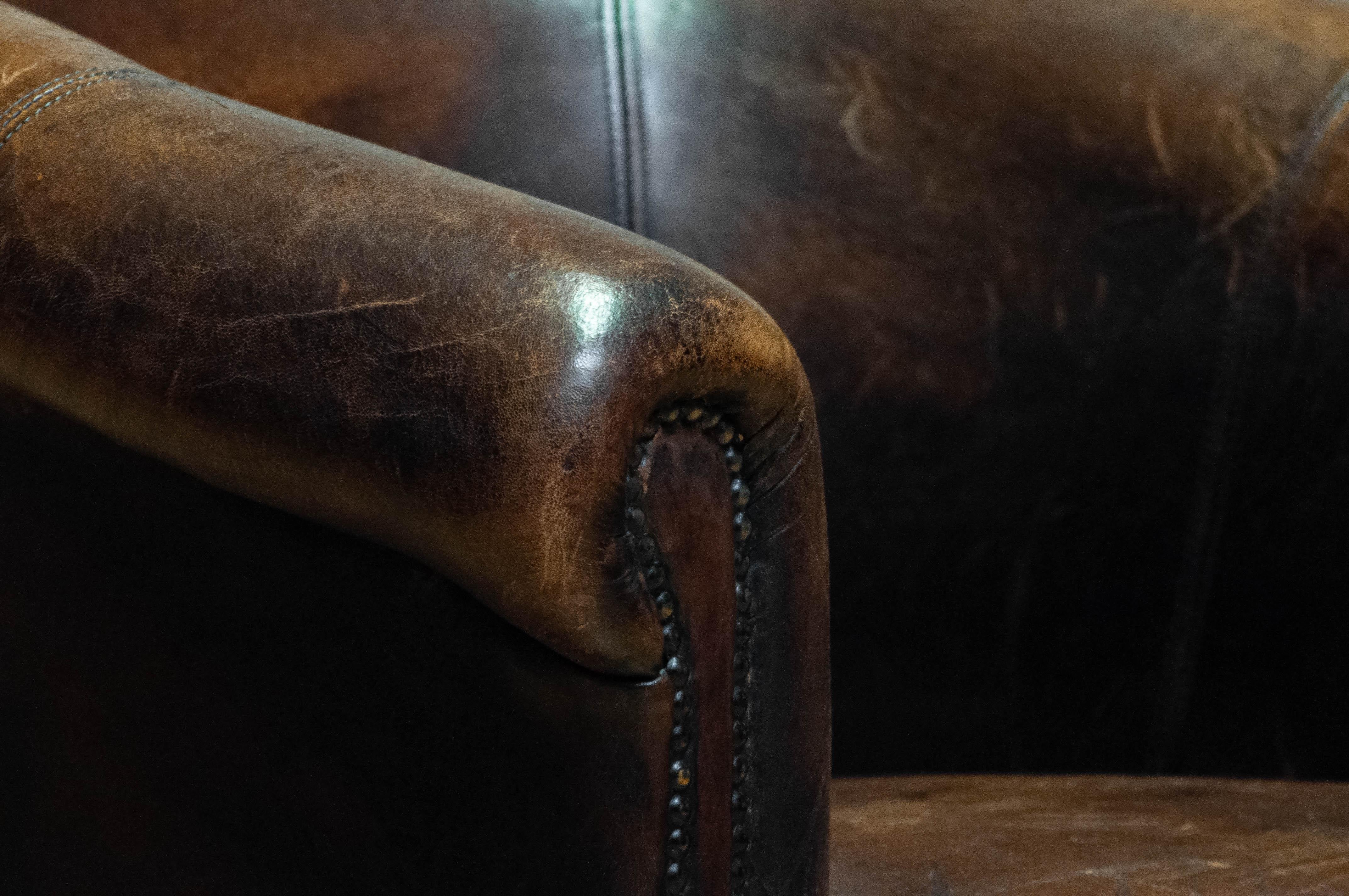 Patinated Dark Brown Dutch Colonial Sheepskin Lounge Club Chair. 1960s For Sale 8
