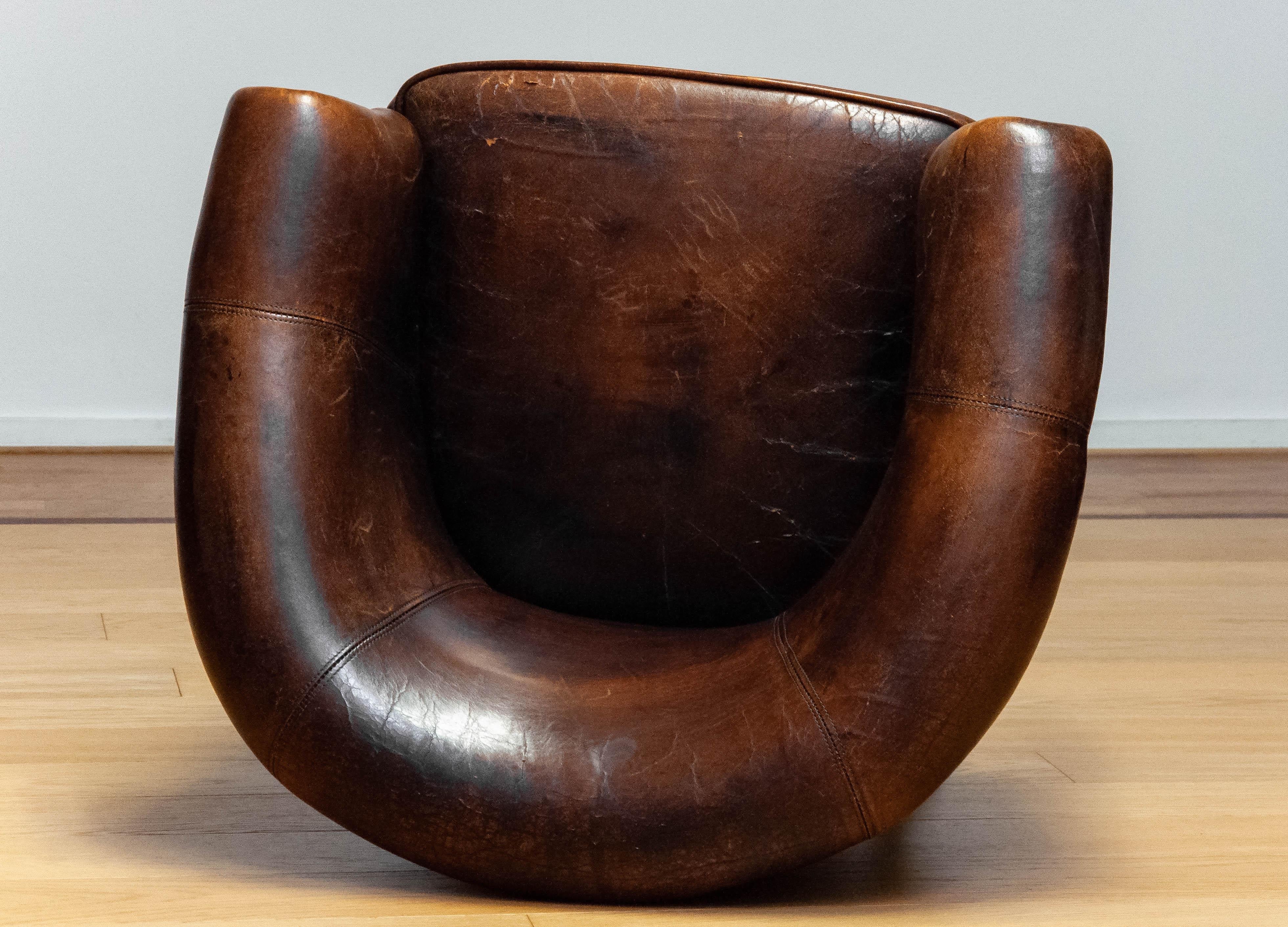Patinated Dark Brown Dutch Colonial Sheepskin Lounge Club Chair. 1960s For Sale 10