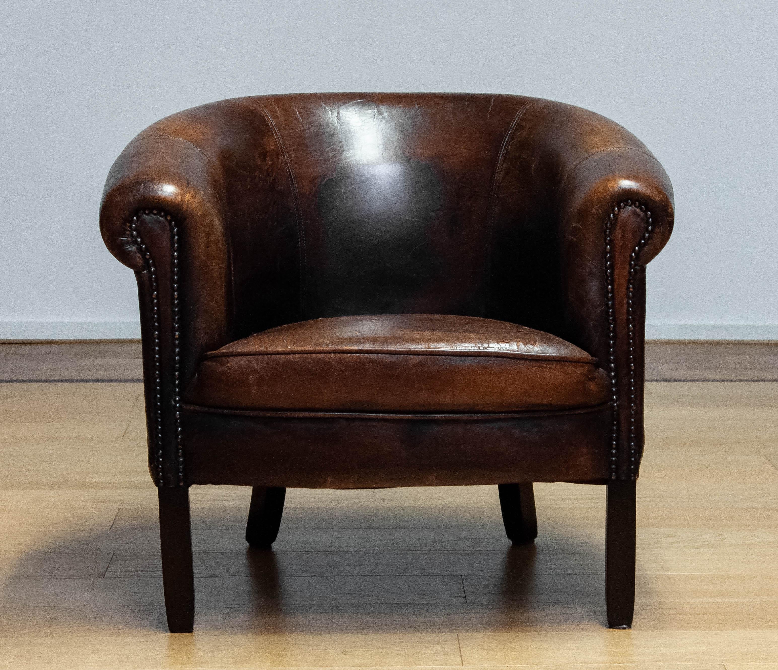 Patinated Dark Brown Dutch Colonial Sheepskin Lounge Club Chair. 1960s For Sale 11