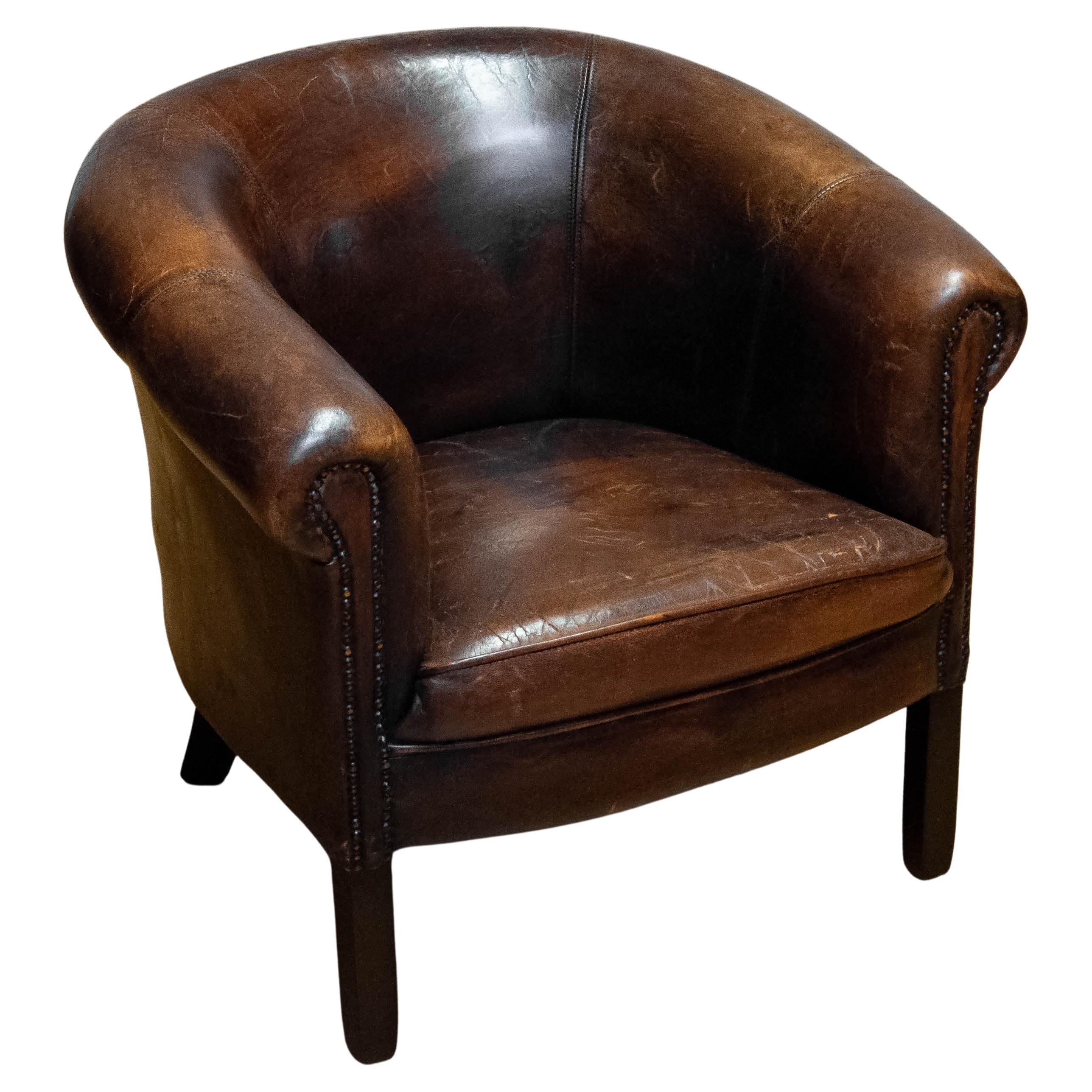 Patinated Dark Brown Dutch Colonial Sheepskin Lounge Club Chair. 1960s