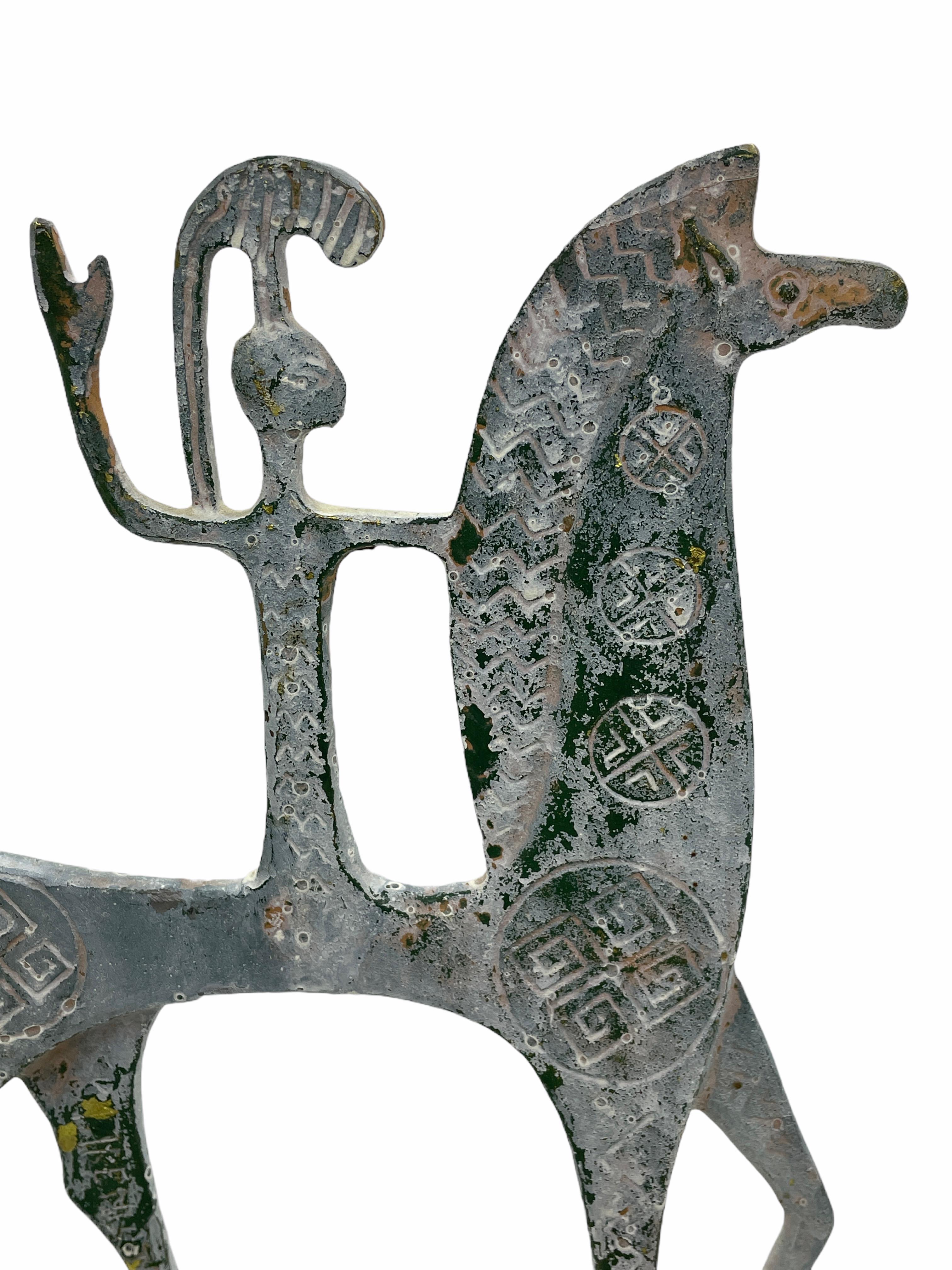 Offered is a Mid-Century Modern Pepe Mendoza style Etruscan or Greek patinated carved brass horse sculptures. This Etruscan Greek brass horse is an iconic Mid-Century Modern item of decor with carved Mid-Century Modern details. It would look