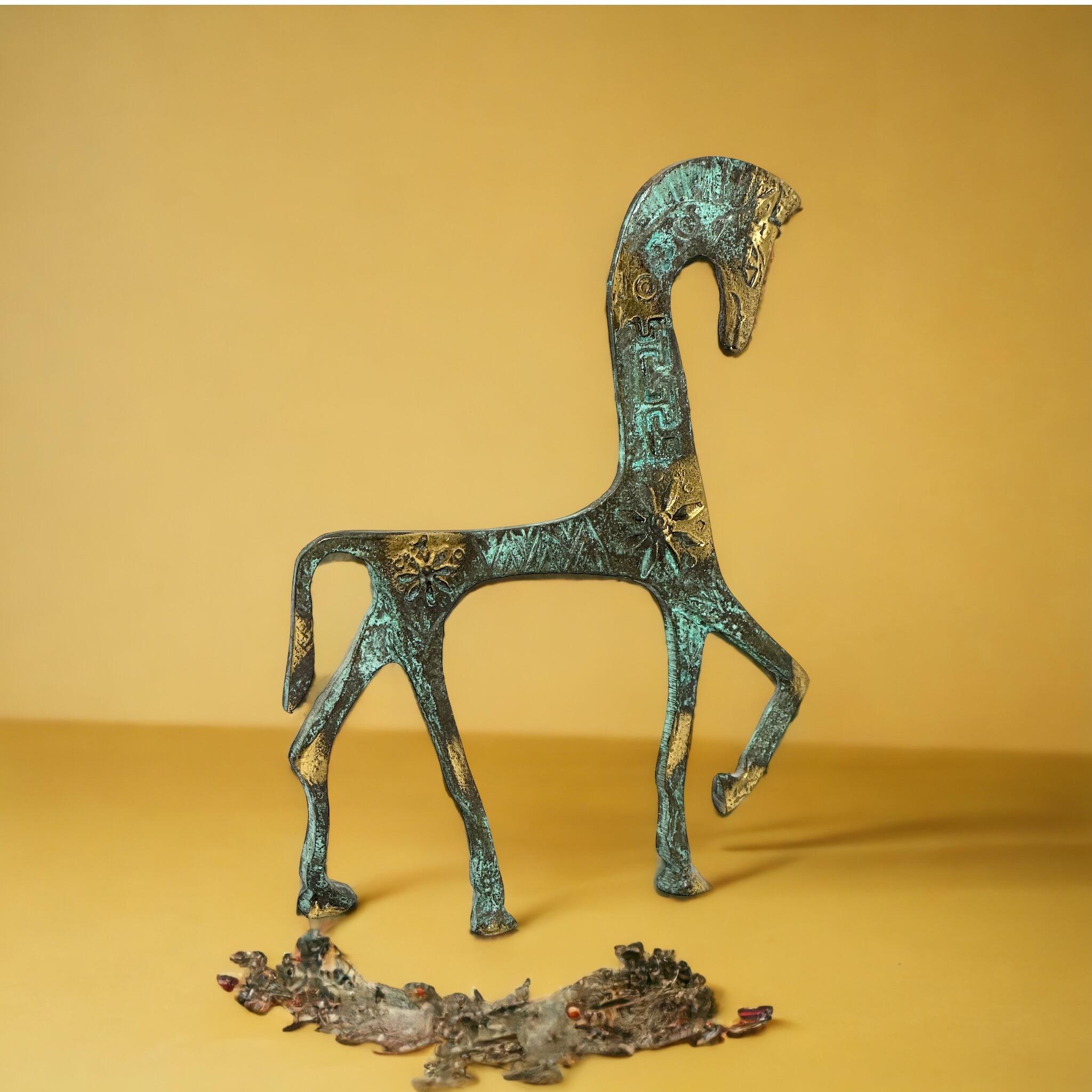 This is a bronze sculpture, in the style of the antique statues and figures of the Etruscans. It is a gorgeous interior furnishing item, an incredibly stylized Etruscan Chariot and has a patina finish. Greece-made and great for any Mid-Century