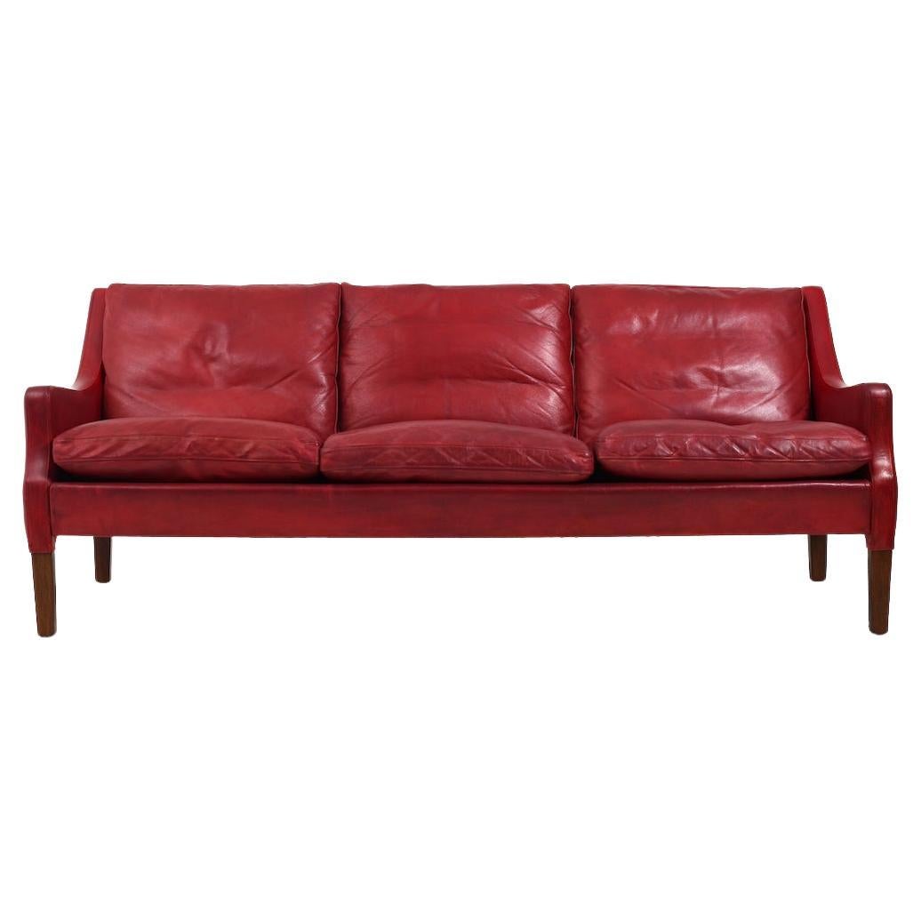 Patiniertes indisches rotes Leder-Sofa von Arne Wahl Iversen