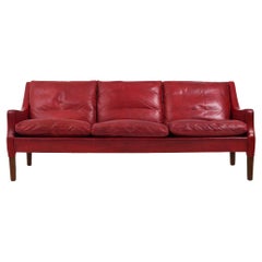 Patiniertes indisches rotes Leder-Sofa von Arne Wahl Iversen