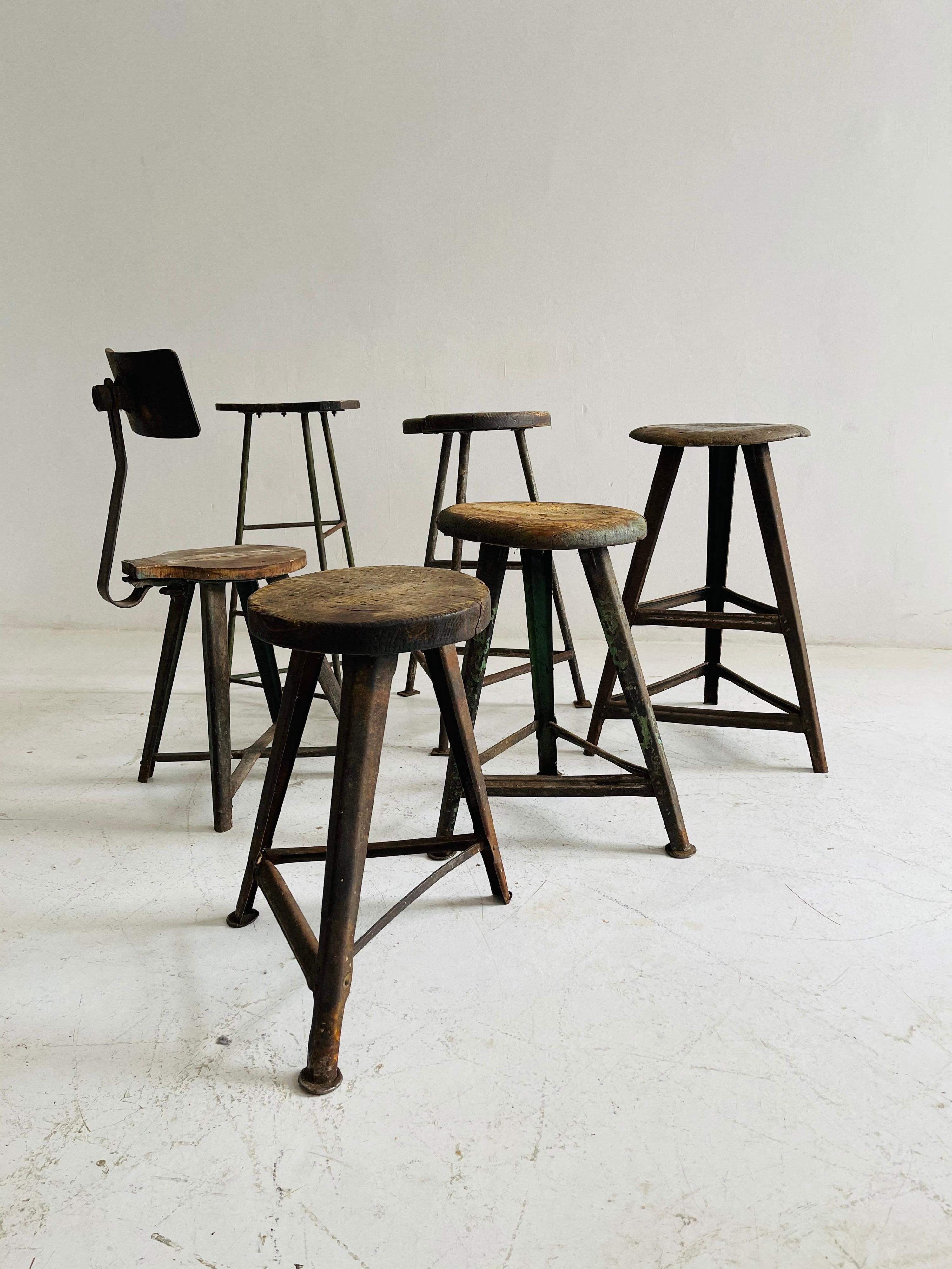 Patinated Industrial Factory stools group of six, Austria, 1930s.