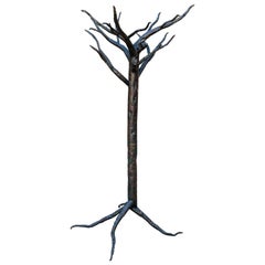 Escultura en forma de árbol de hierro patinado