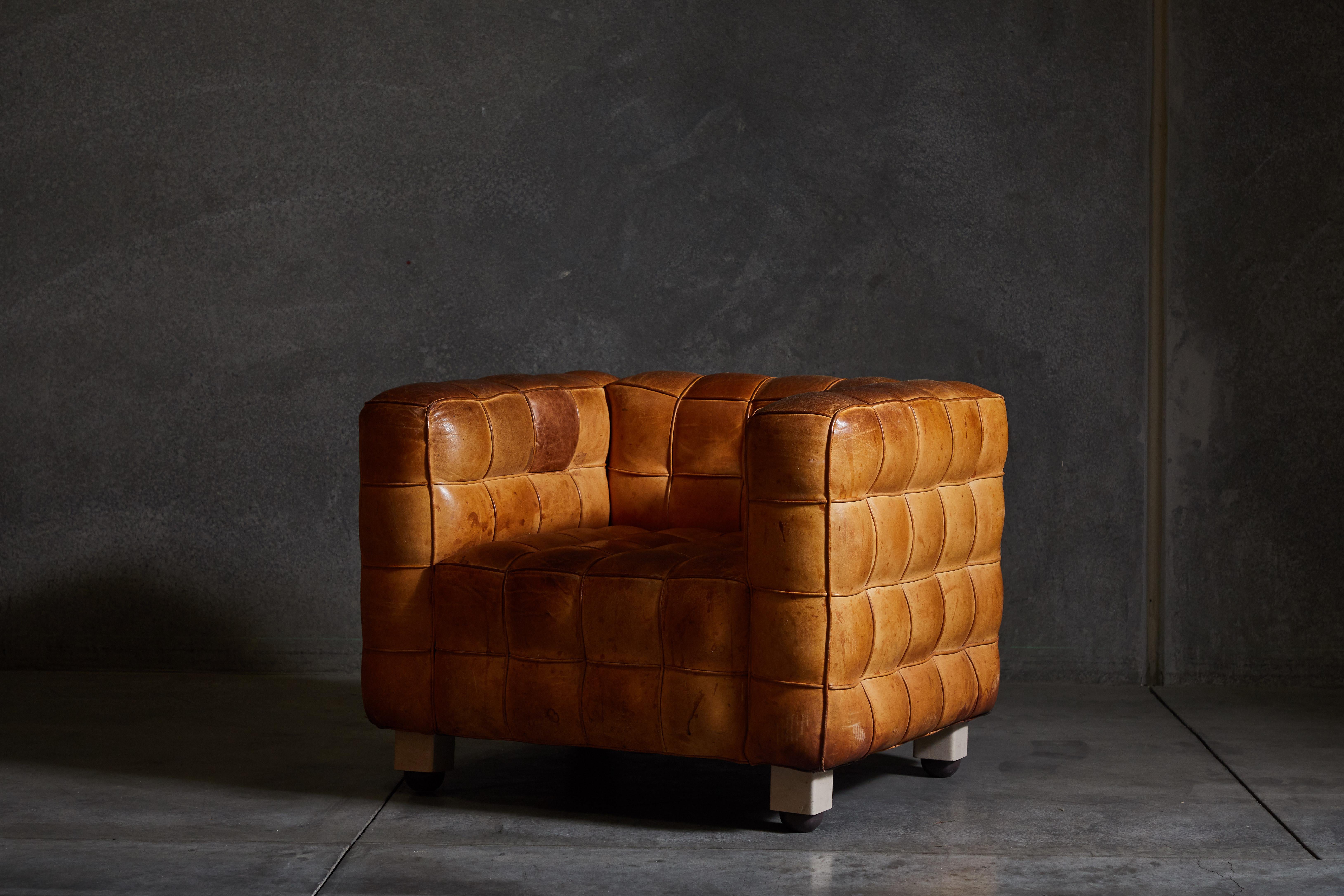Patinated cognac tufted leather 