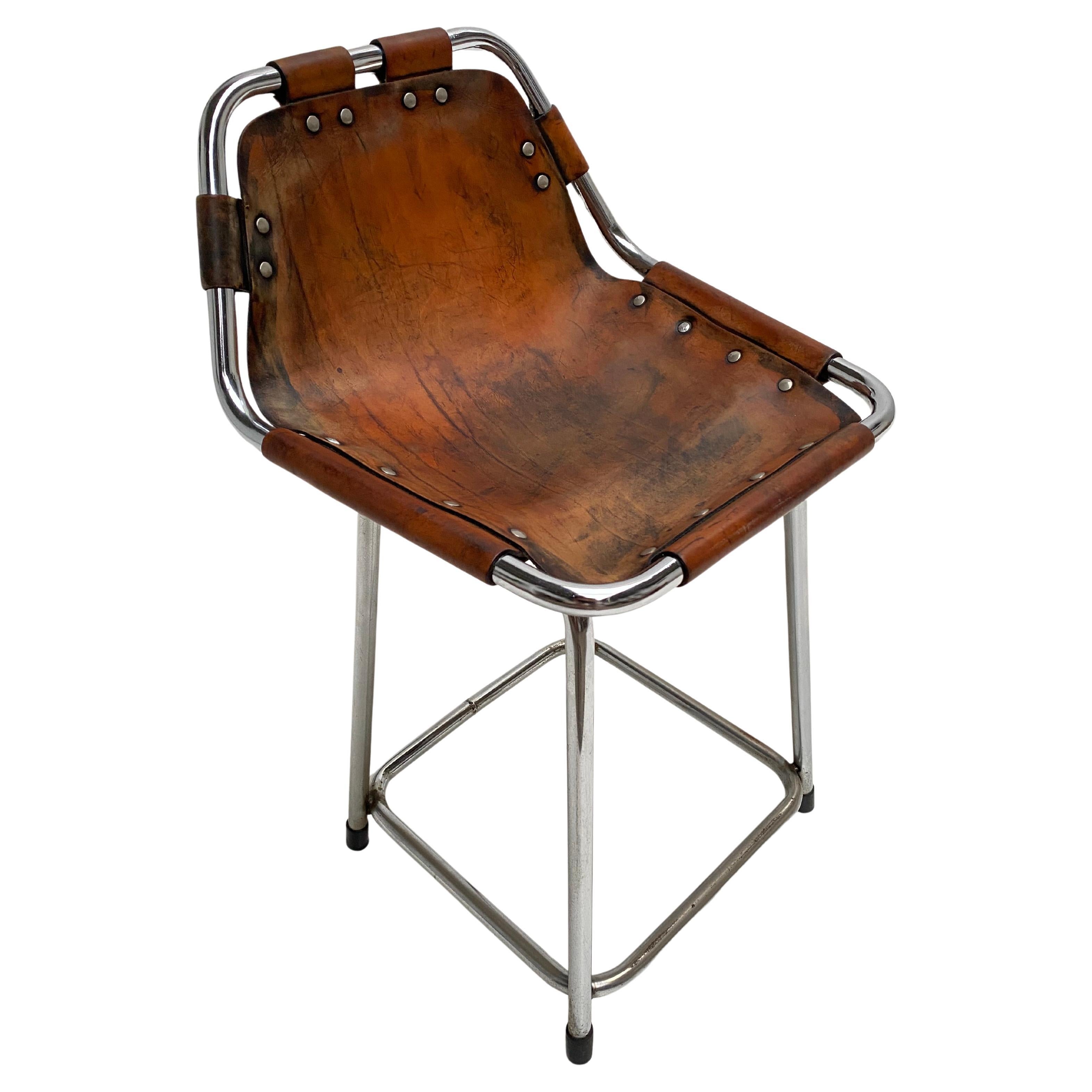 A lovely low bar stool, selected for Les Arcs ski resort in the 1960's by Charlotte Perriand

The cheapest, cutest and lowest of these stool available online worldwide!

Produced by Dal Vera Italy and distributed by Brabantia in The Netherlands in