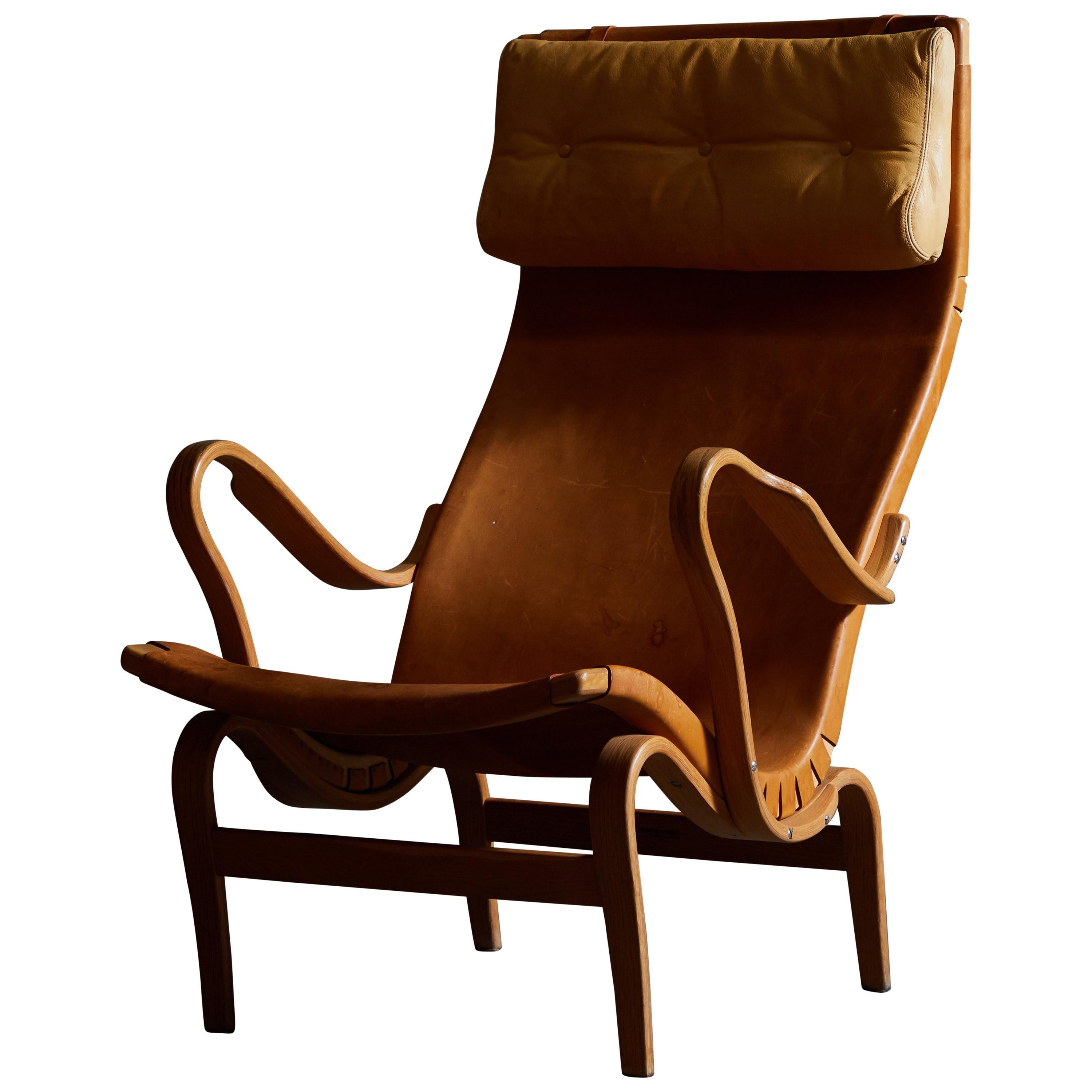 Patinated Leather Pernilla Lounge Chair by Bruno Mathsson