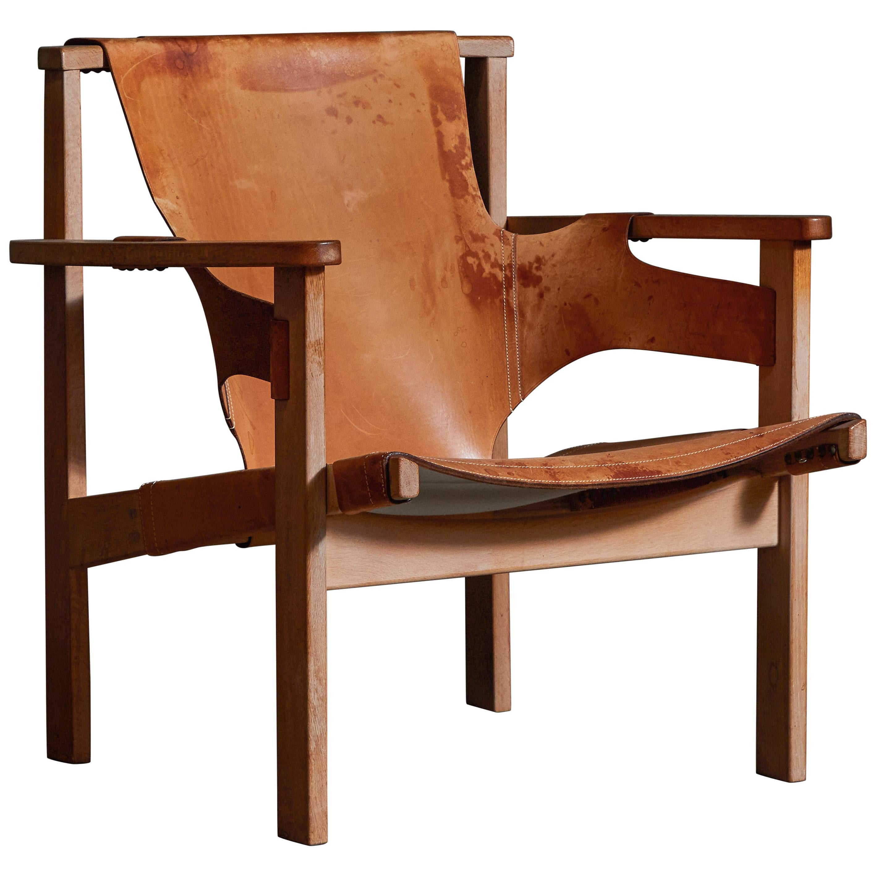 Patinated Leather "Trienna" Lounge Chair by Carl-Axel Acking