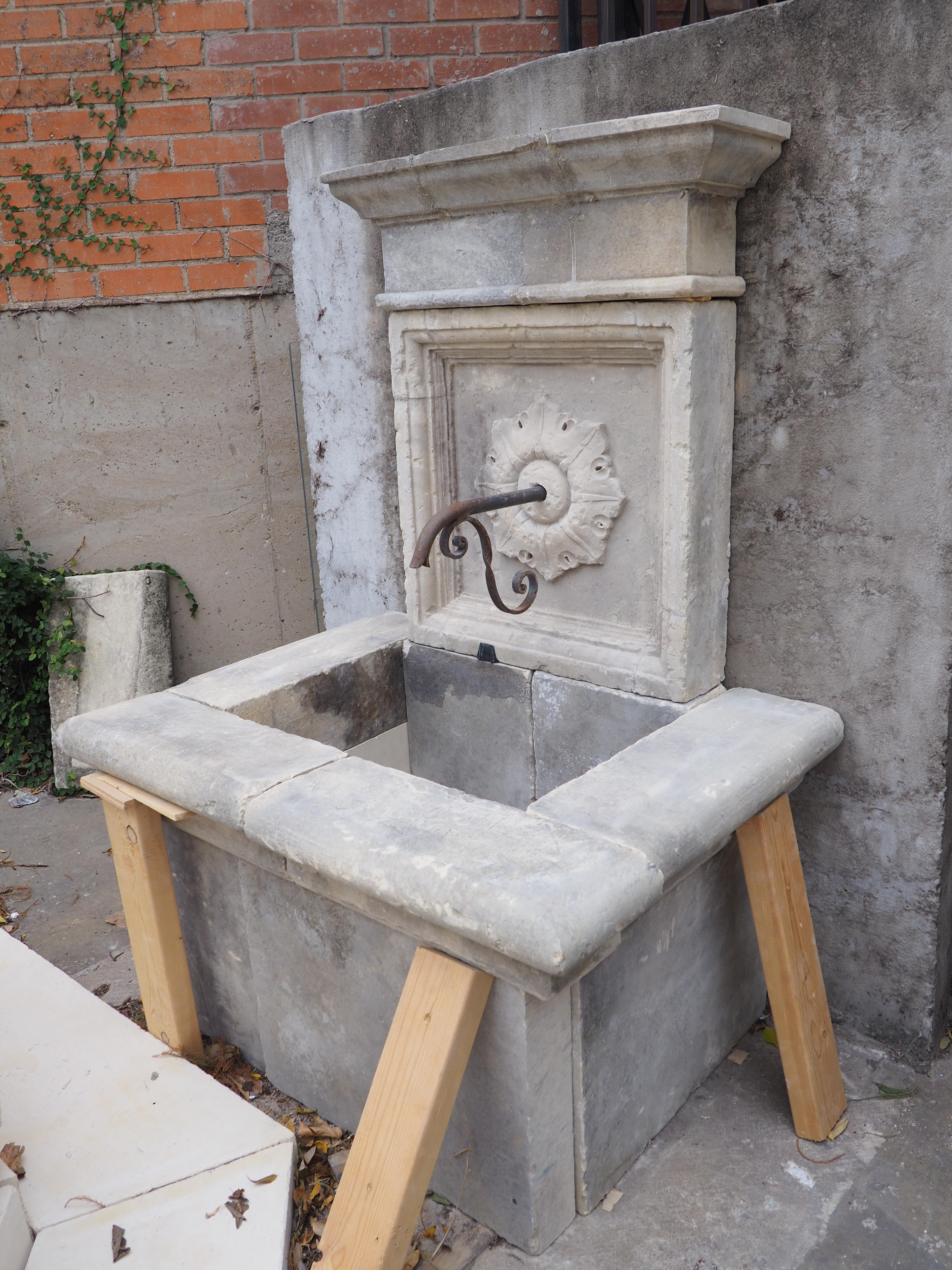 Hand-Carved Patinated Limestone Wall Fountain from Southern Italy