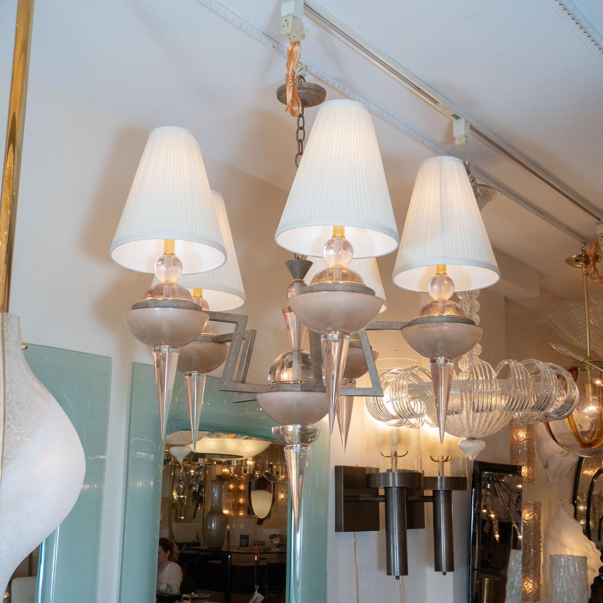 Patinated metal and Lucite five arm chandelier with conical details by Hivo Van Teal.
