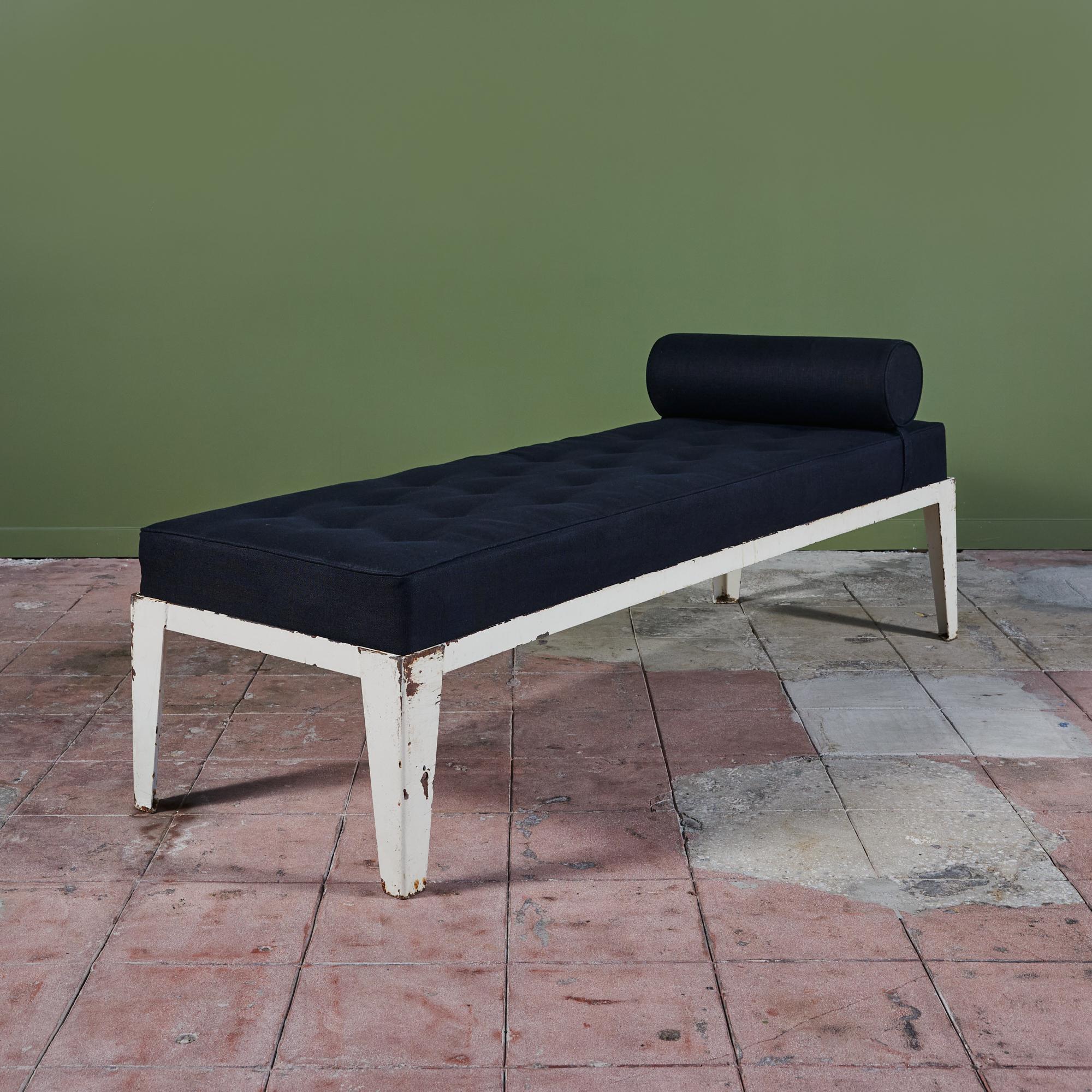 Patinated steel daybed with tufted cushion in black cotton linen fabric with bolster. This piece can also be used in an outdoor setting with an outdoor fabric. We have four frames available, please inquire for COM. 

Dimensions
81.5” width x 27.5”