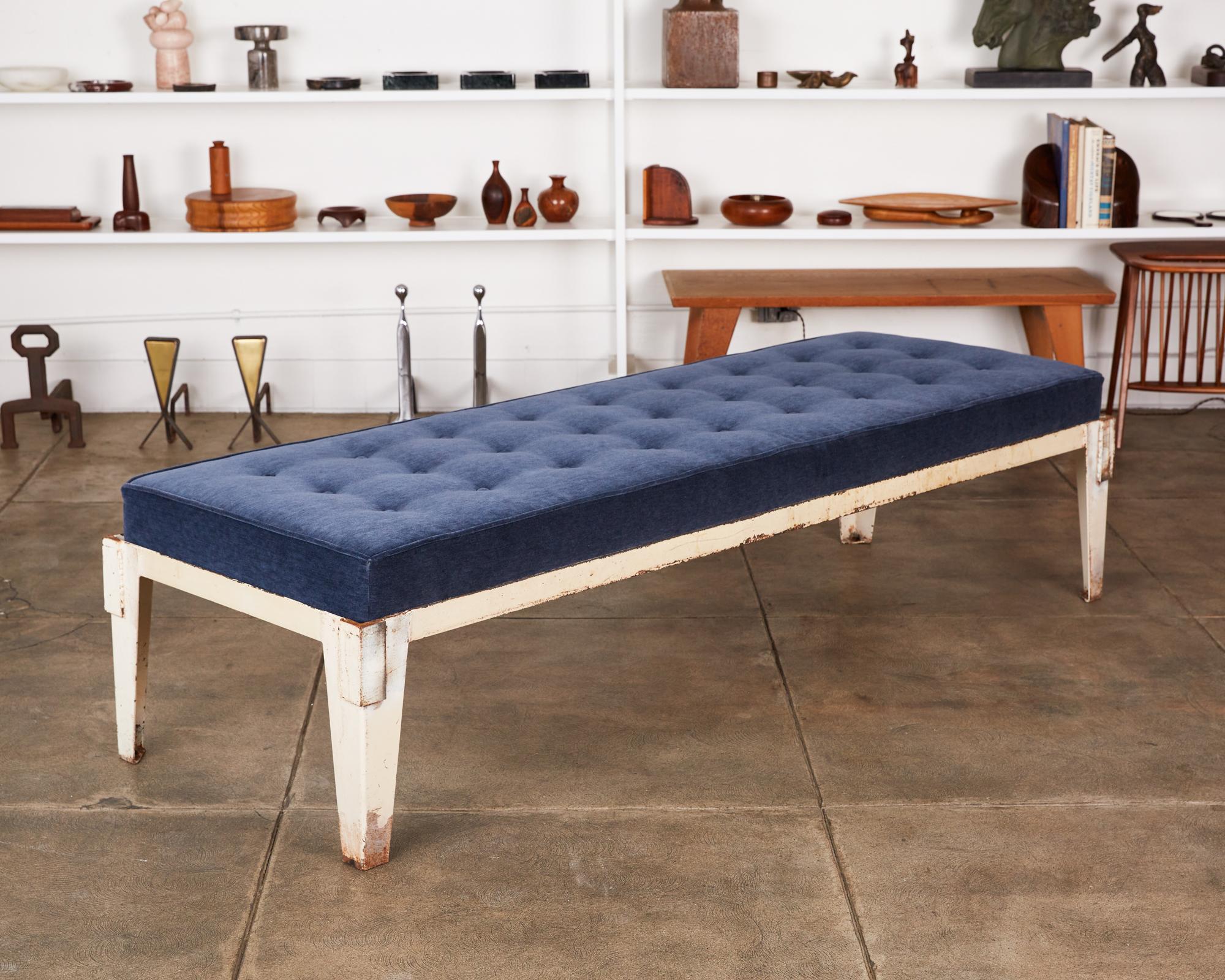 Jean Prouvé style patinated steel daybed with tufted cushion in Italian indigo cotton velvet. Cushions can be COM or we can provide upholstery options. We have 4 daybed frames available.

Dimensions: 81.5” width x 27.5” depth x 20”