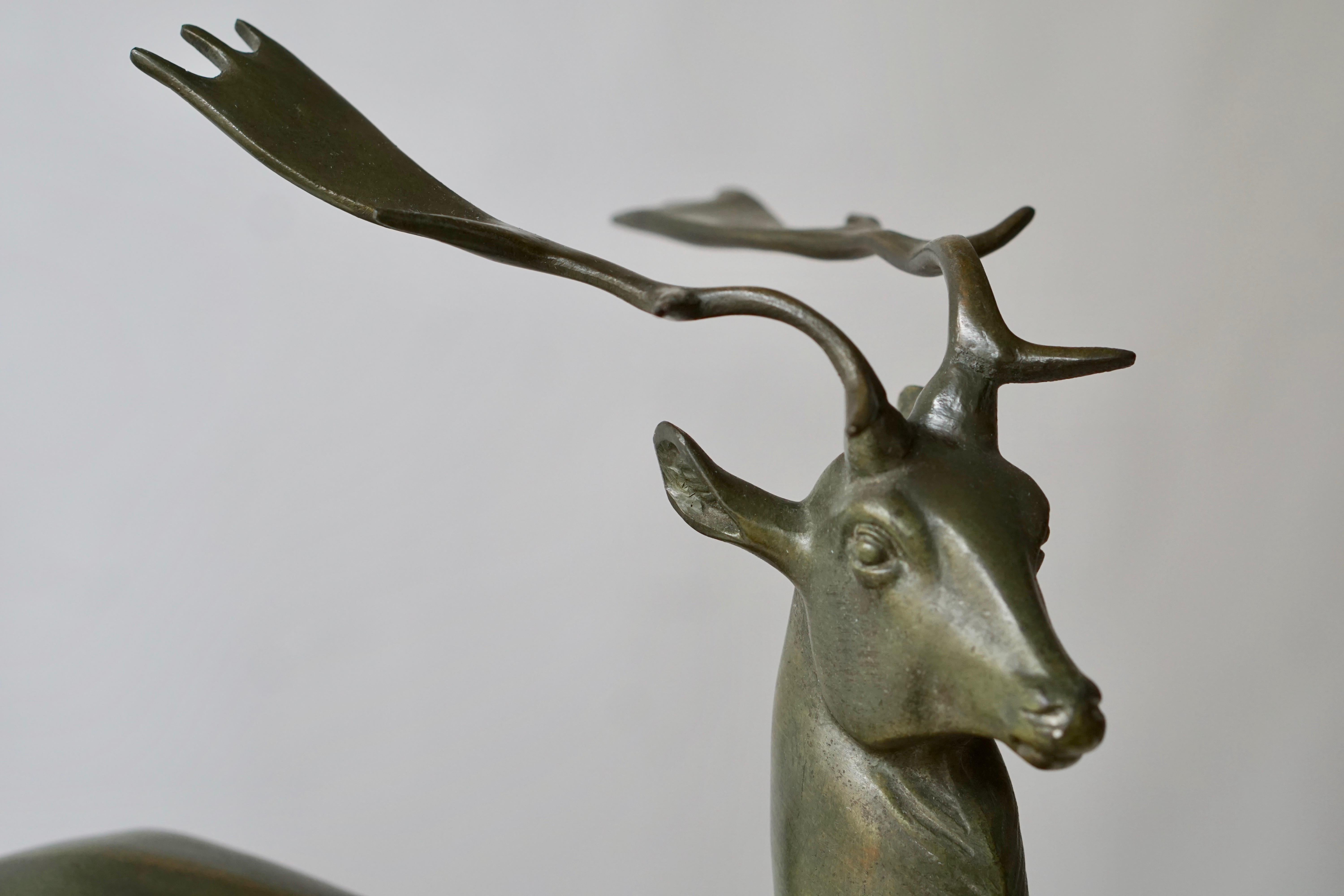 Patinated Metal Figure of a Deer 3