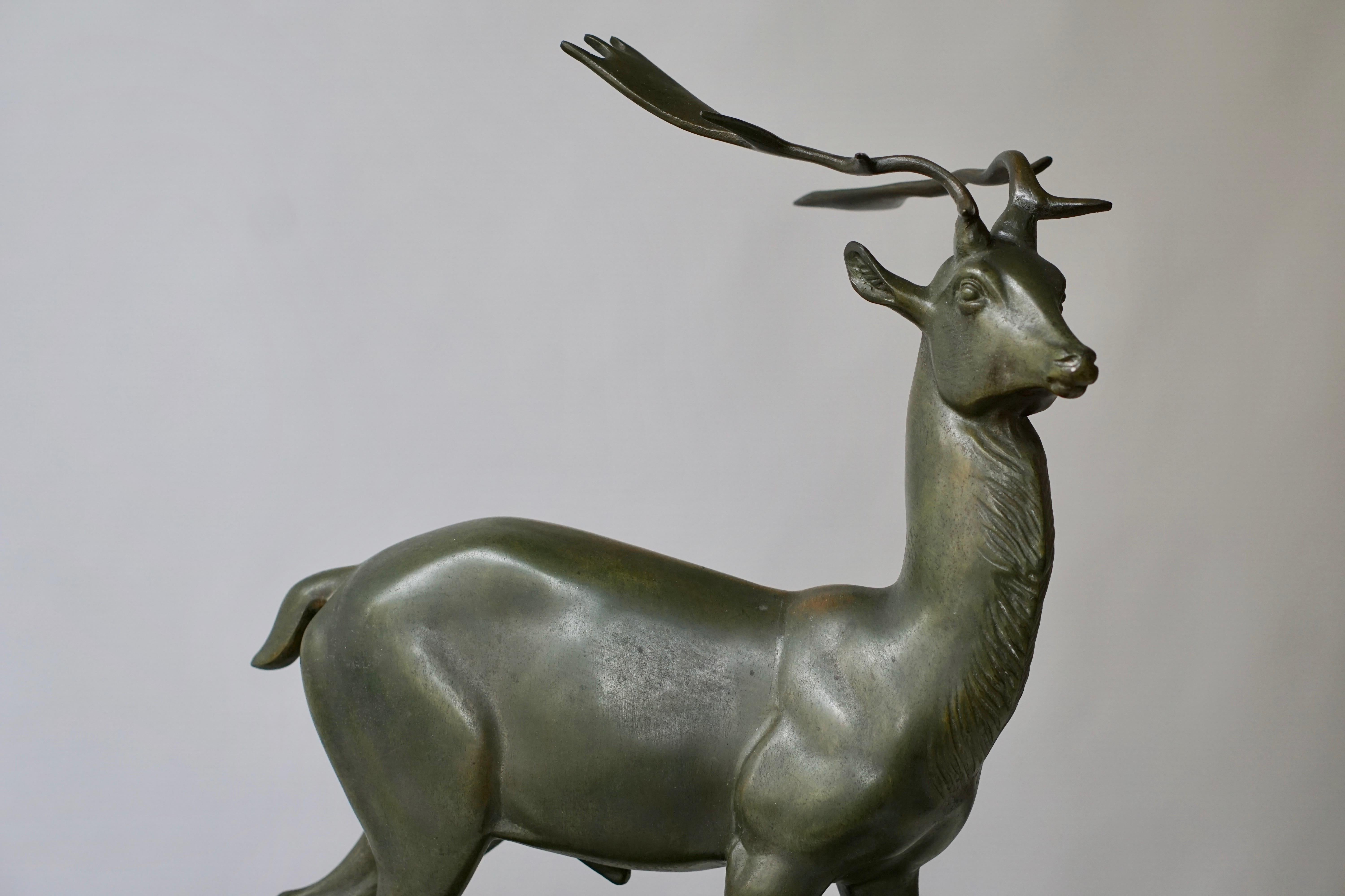 Patinated Metal Figure of a Deer 4