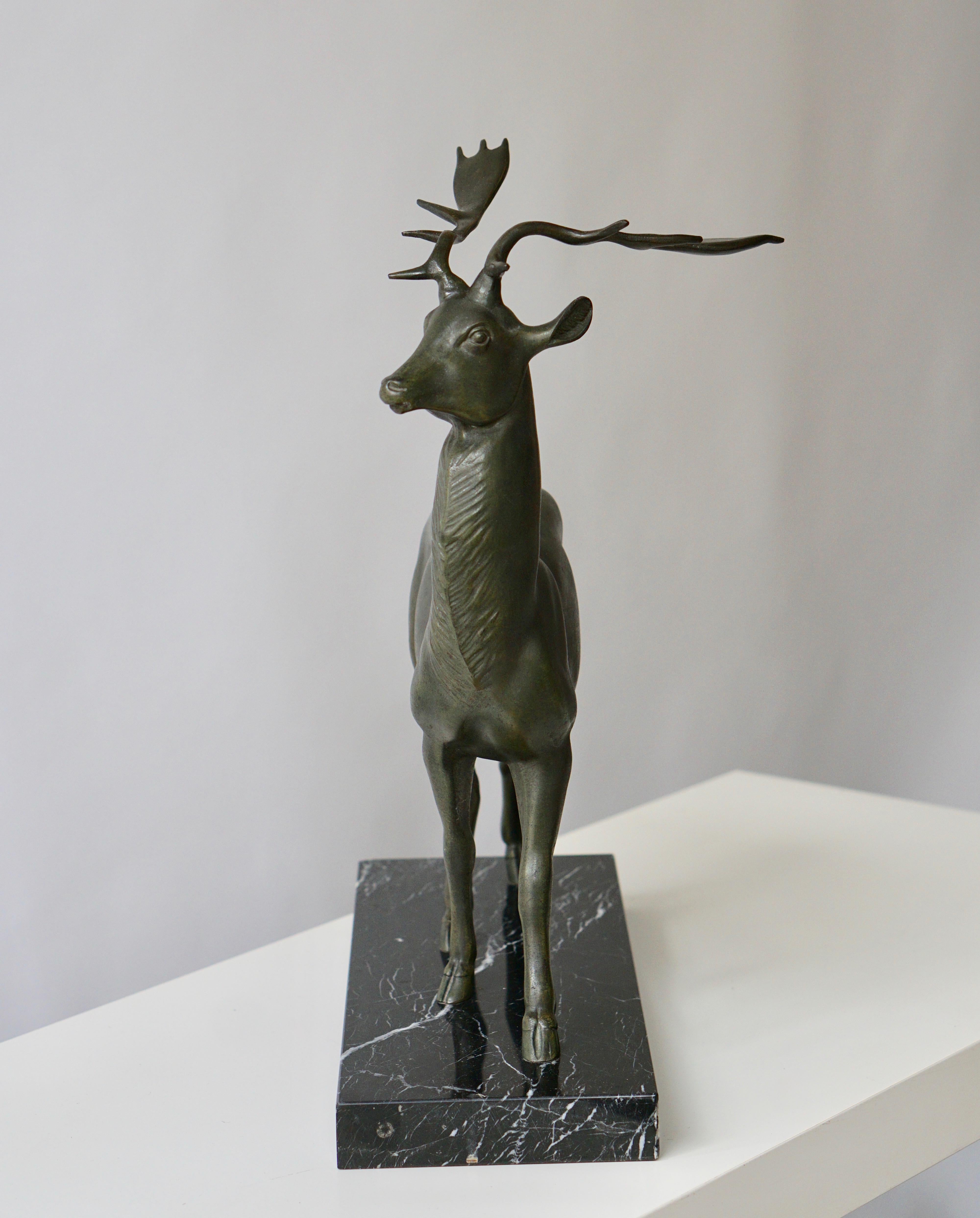 Patinated Metal Figure of a Deer 1