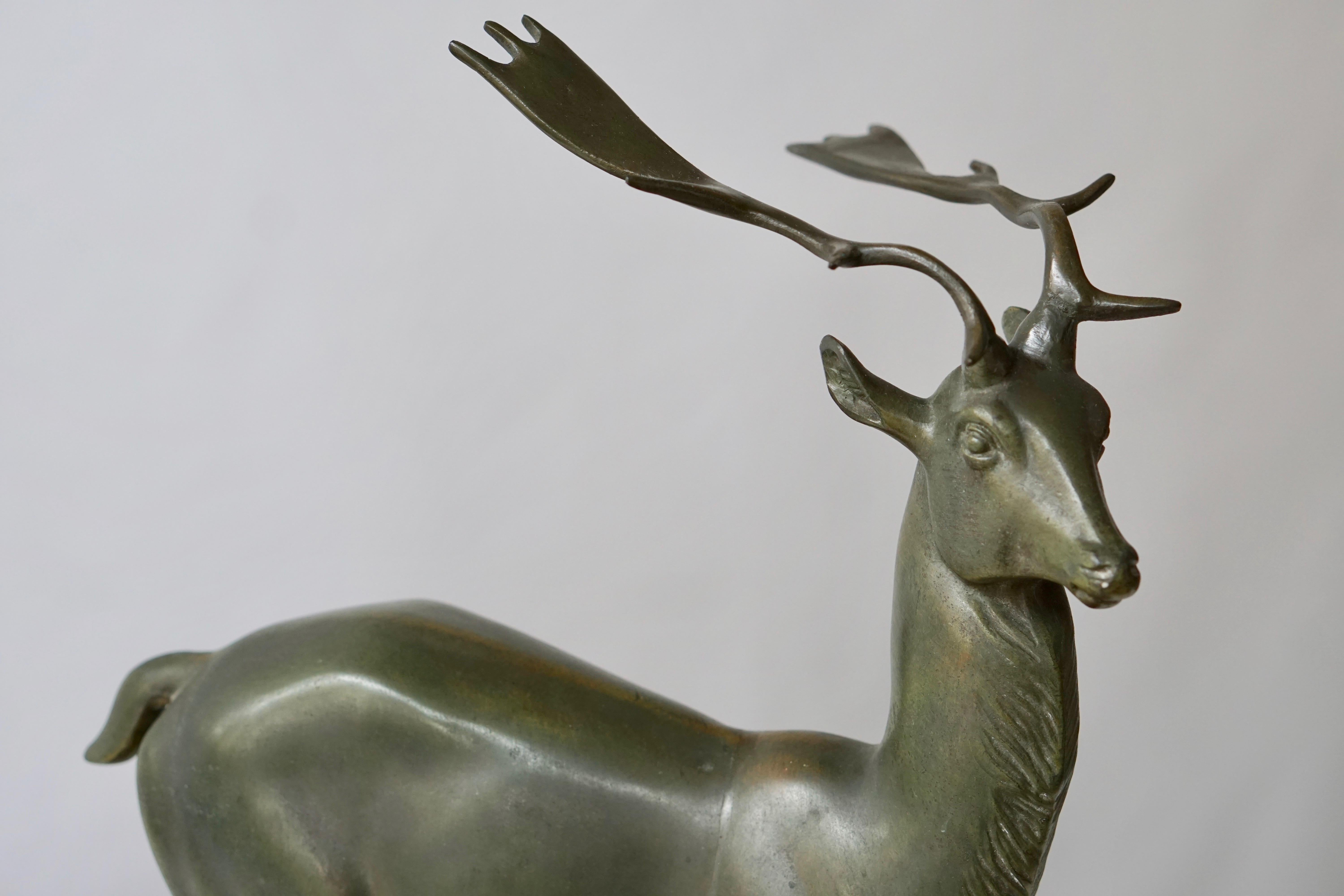 Patinated Metal Figure of a Deer 2