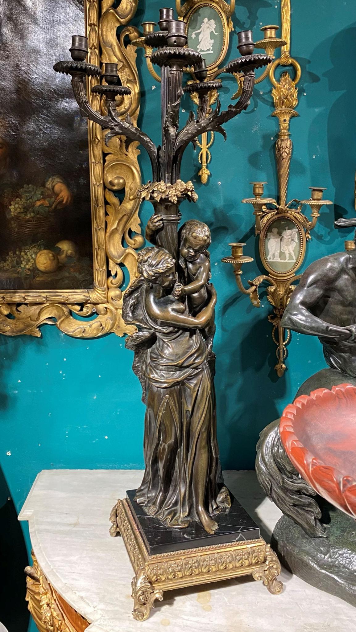 Patinated Neoclassical Figural Candelabra After Claude Michel, aka Clodion In Good Condition For Sale In New York, NY