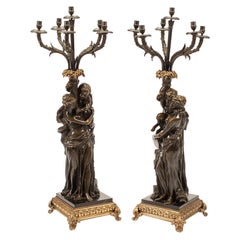 Patinated Neoclassical Figural Candelabra After Claude Michel, aka Clodion