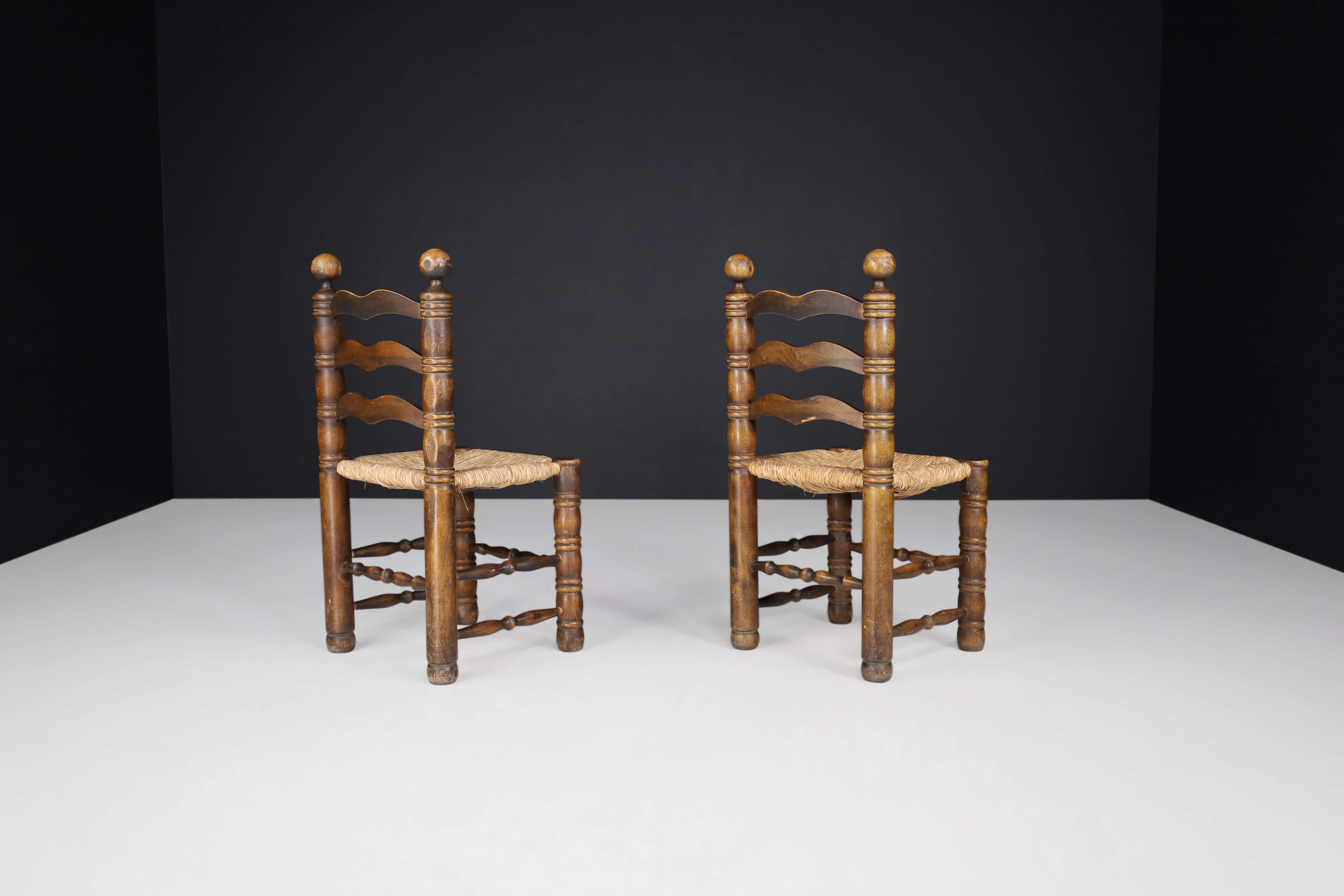 Patinated Oak and Rush Turned Chairs by Charles Dudouyt, France, 1940s For Sale 4