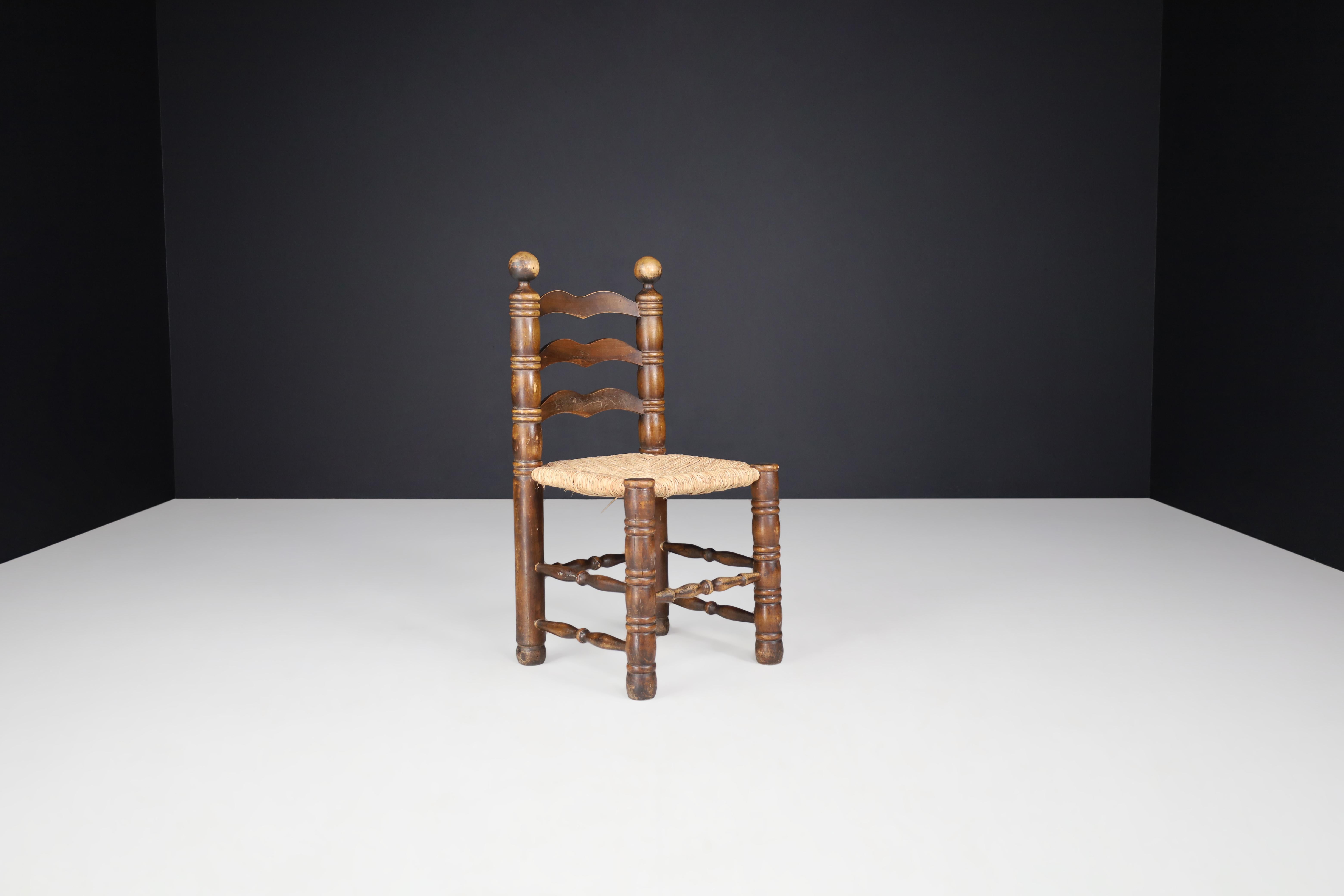 Art Deco Patinated Oak and Rush Turned Chairs by Charles Dudouyt, France, 1940s For Sale