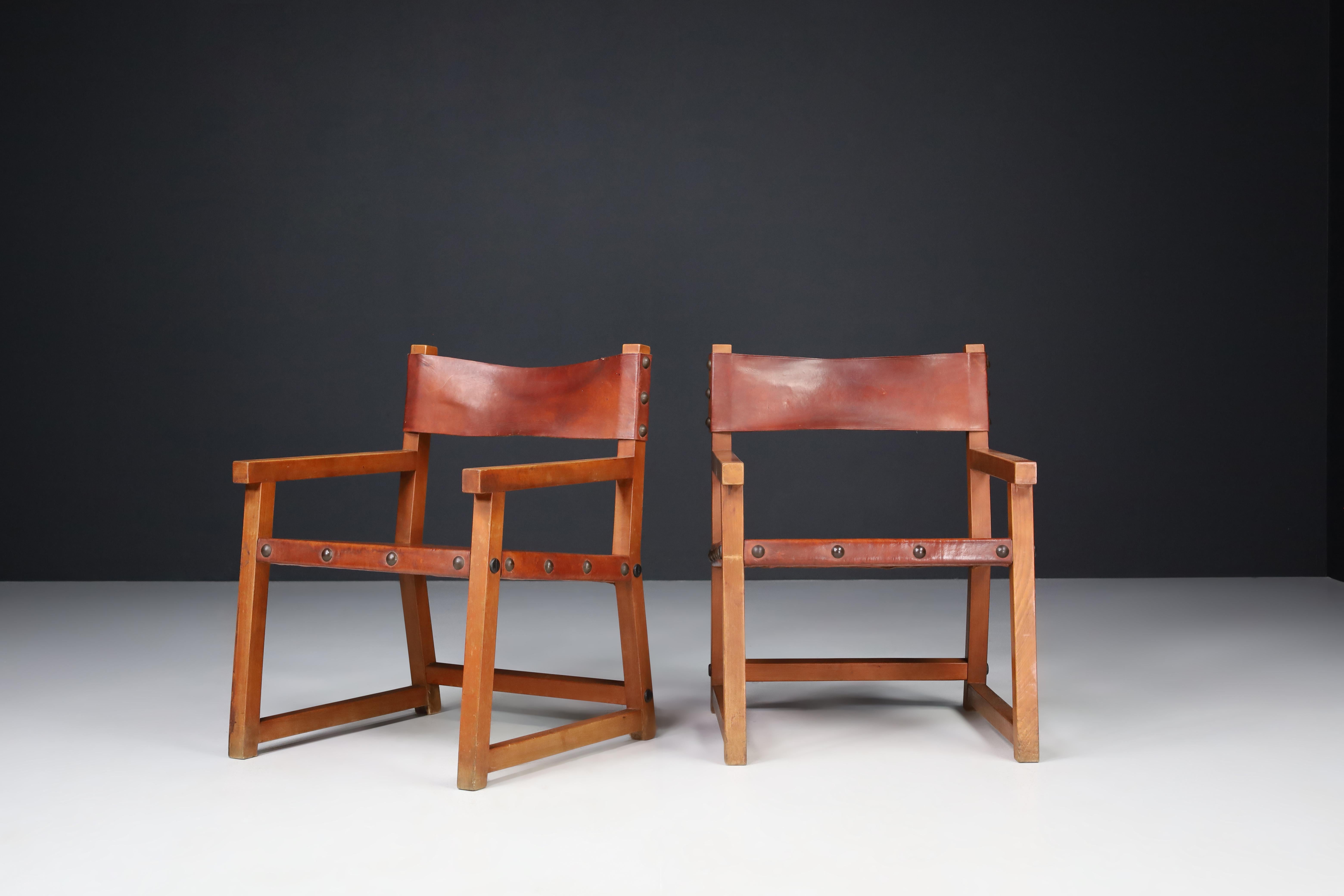 Patinated Saddle Leather Armchairs, Spain, 1950s 4