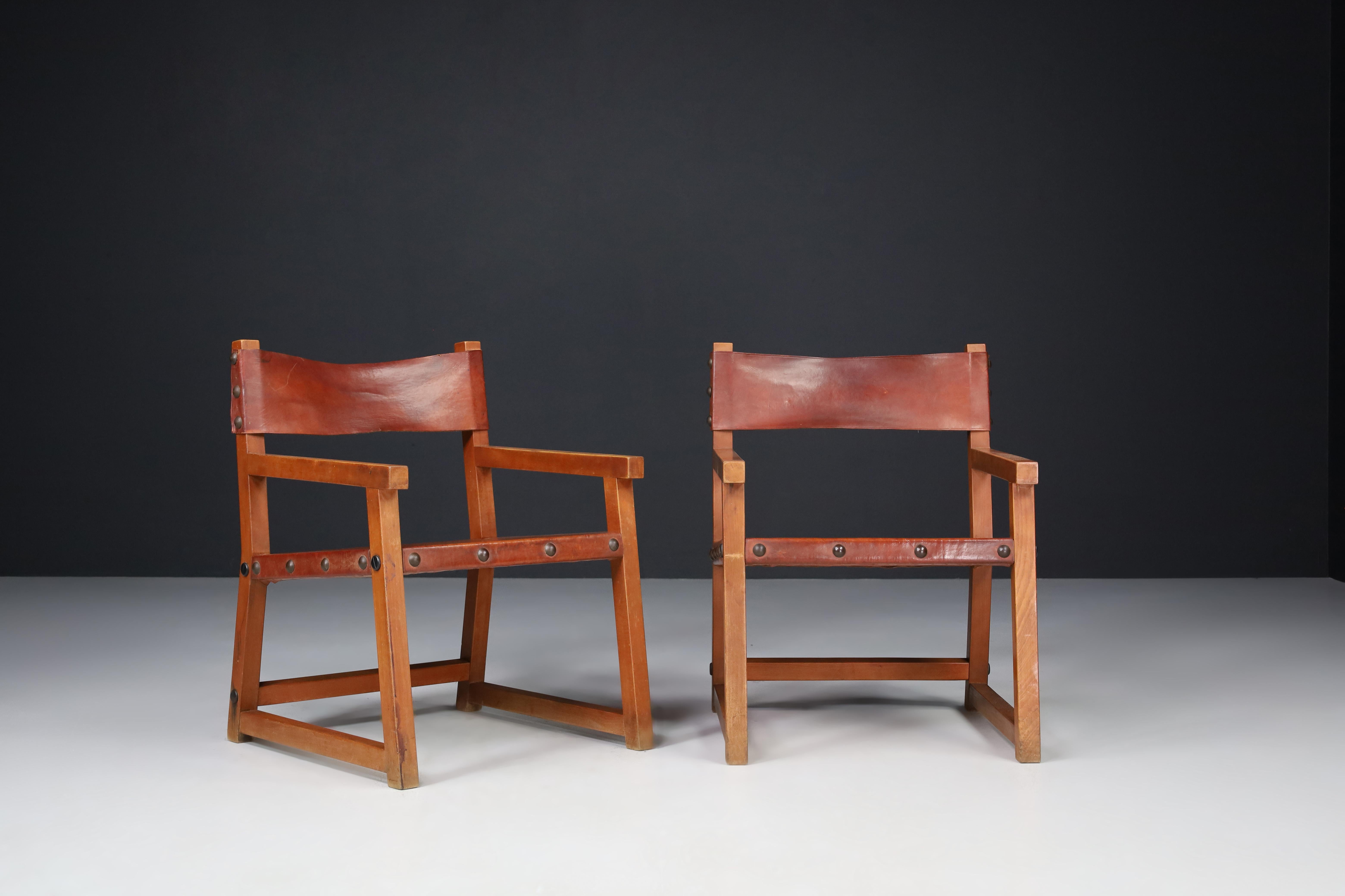 Brutalist Patinated Saddle Leather Armchairs, Spain, 1950s