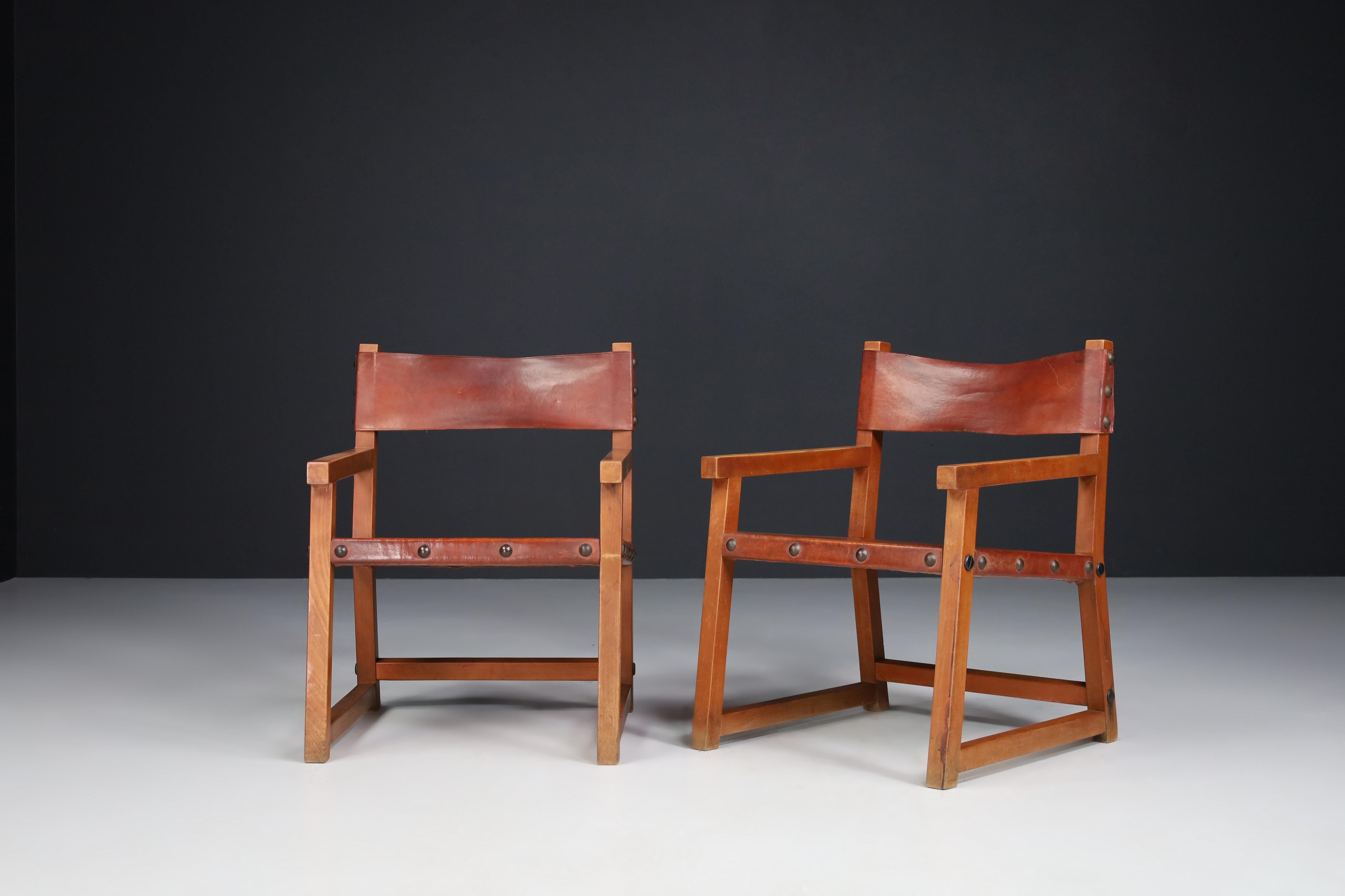Spanish Patinated Saddle Leather Armchairs, Spain, 1950s