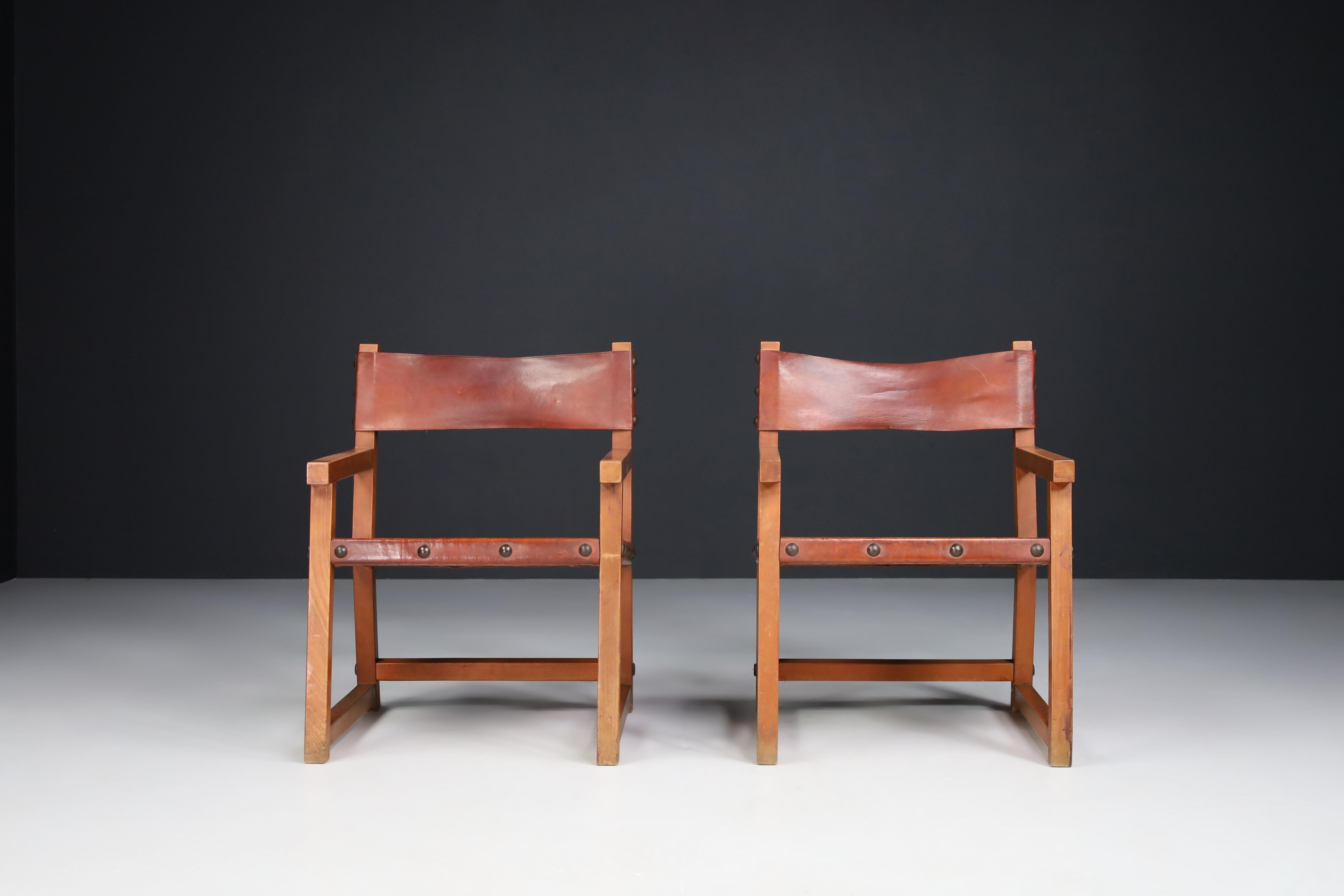 Patinated Saddle Leather Armchairs, Spain, 1950s 1