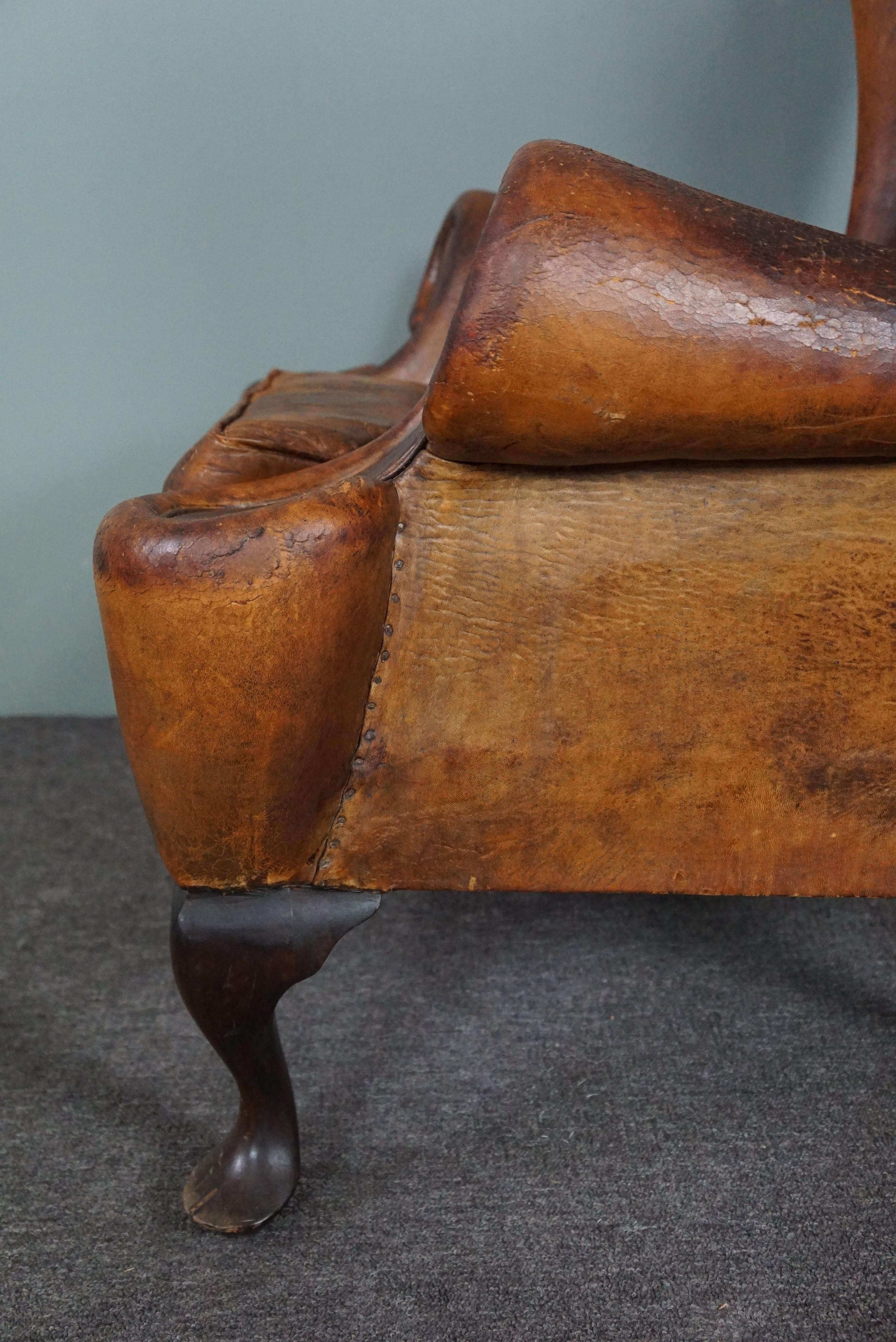 Patinated sheepskin antique Wingback wingback armchair For Sale 4